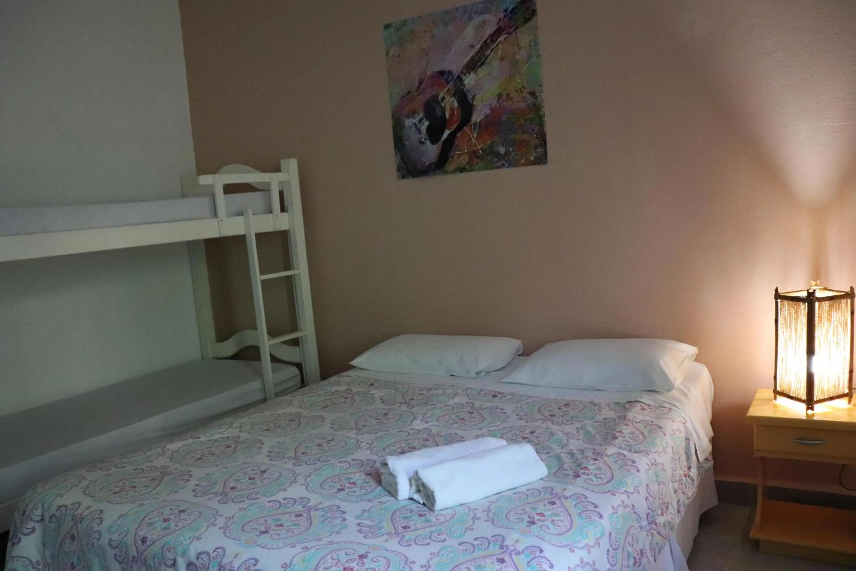 Bed in Pousada Liras da Poesia