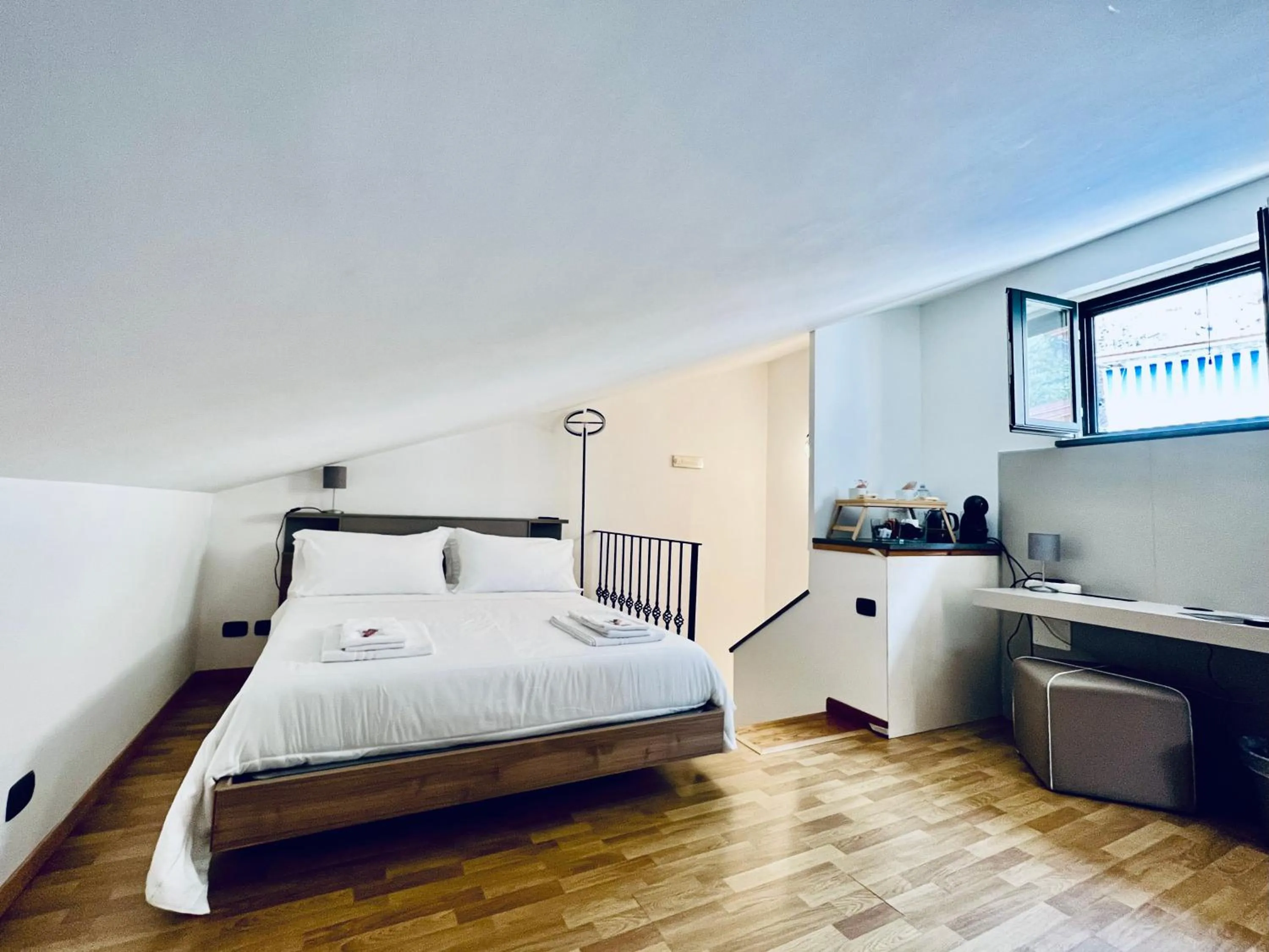 Bed in Eterea Charming Suites