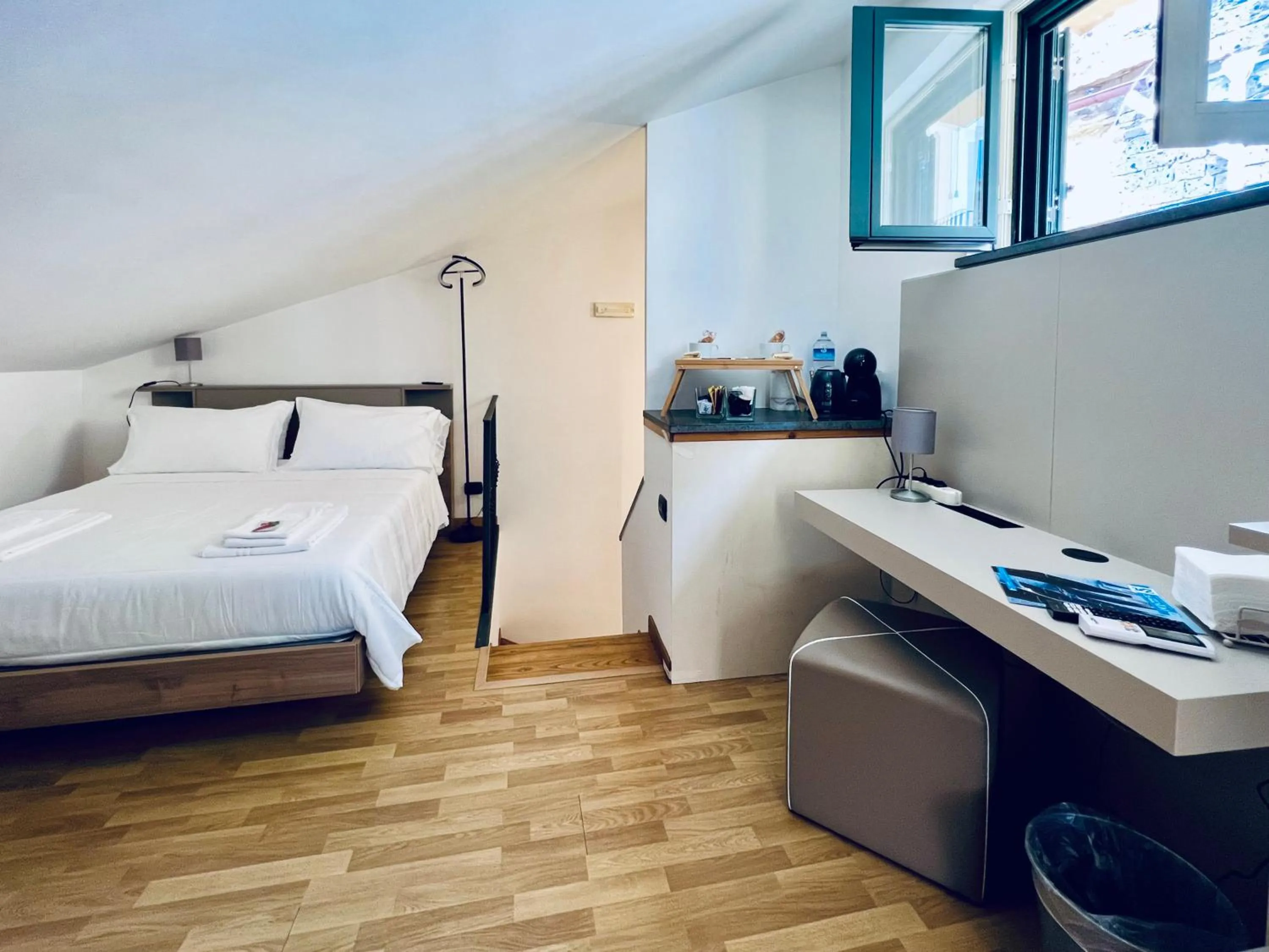 Bed in Eterea Charming Suites