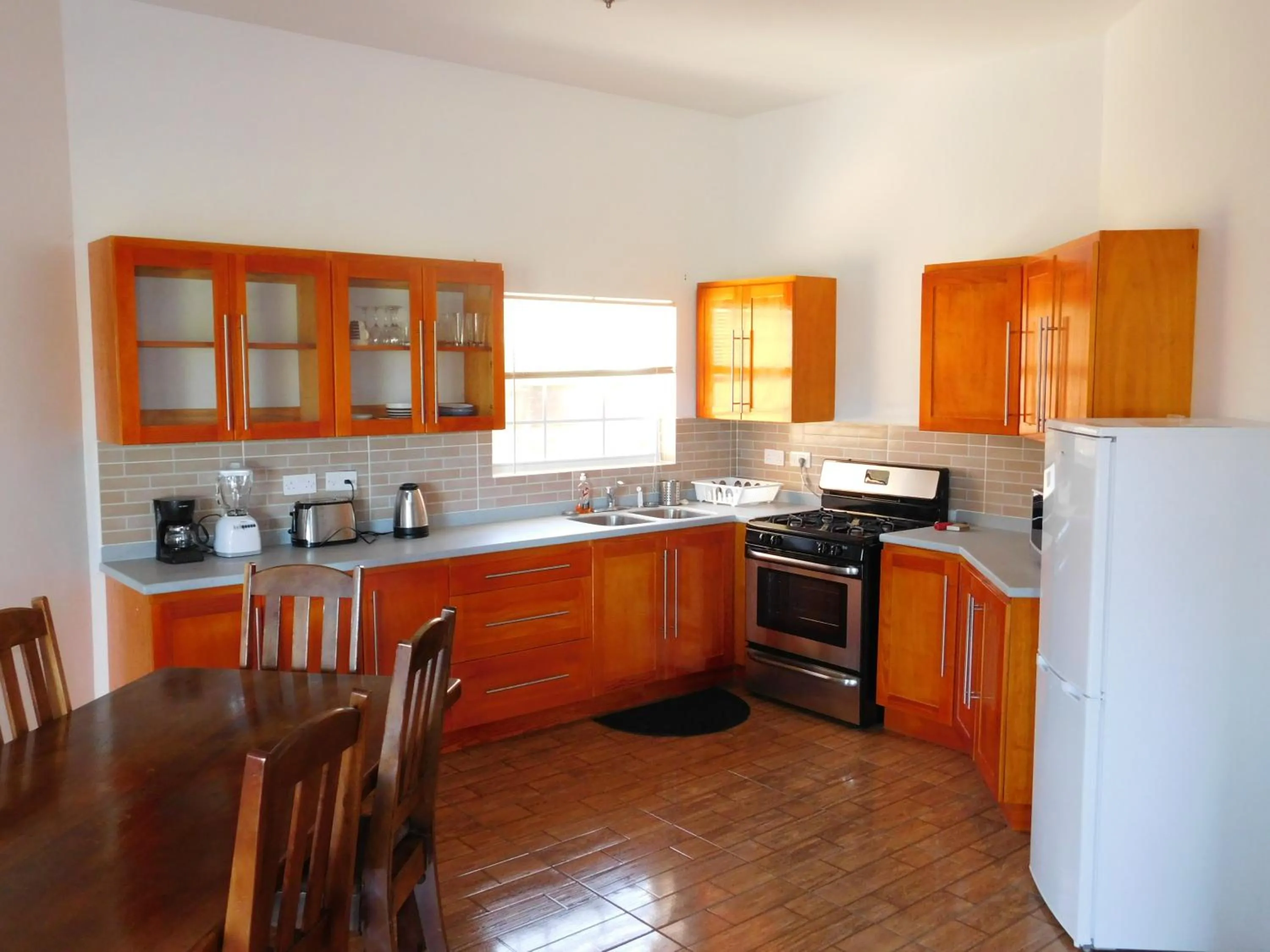 Kitchen or kitchenette in La Heliconia & Day Spa