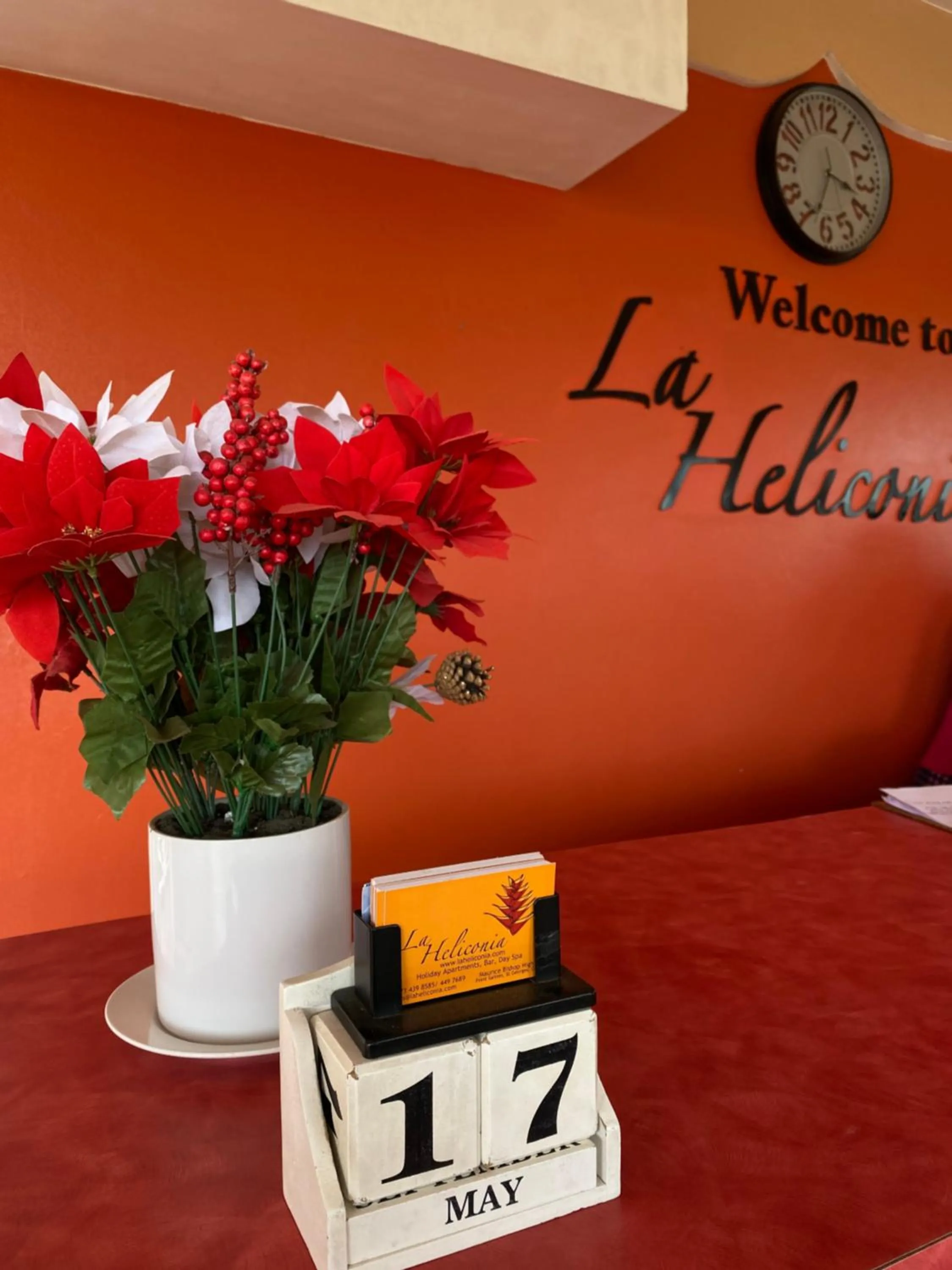 Property logo or sign in La Heliconia & Day Spa