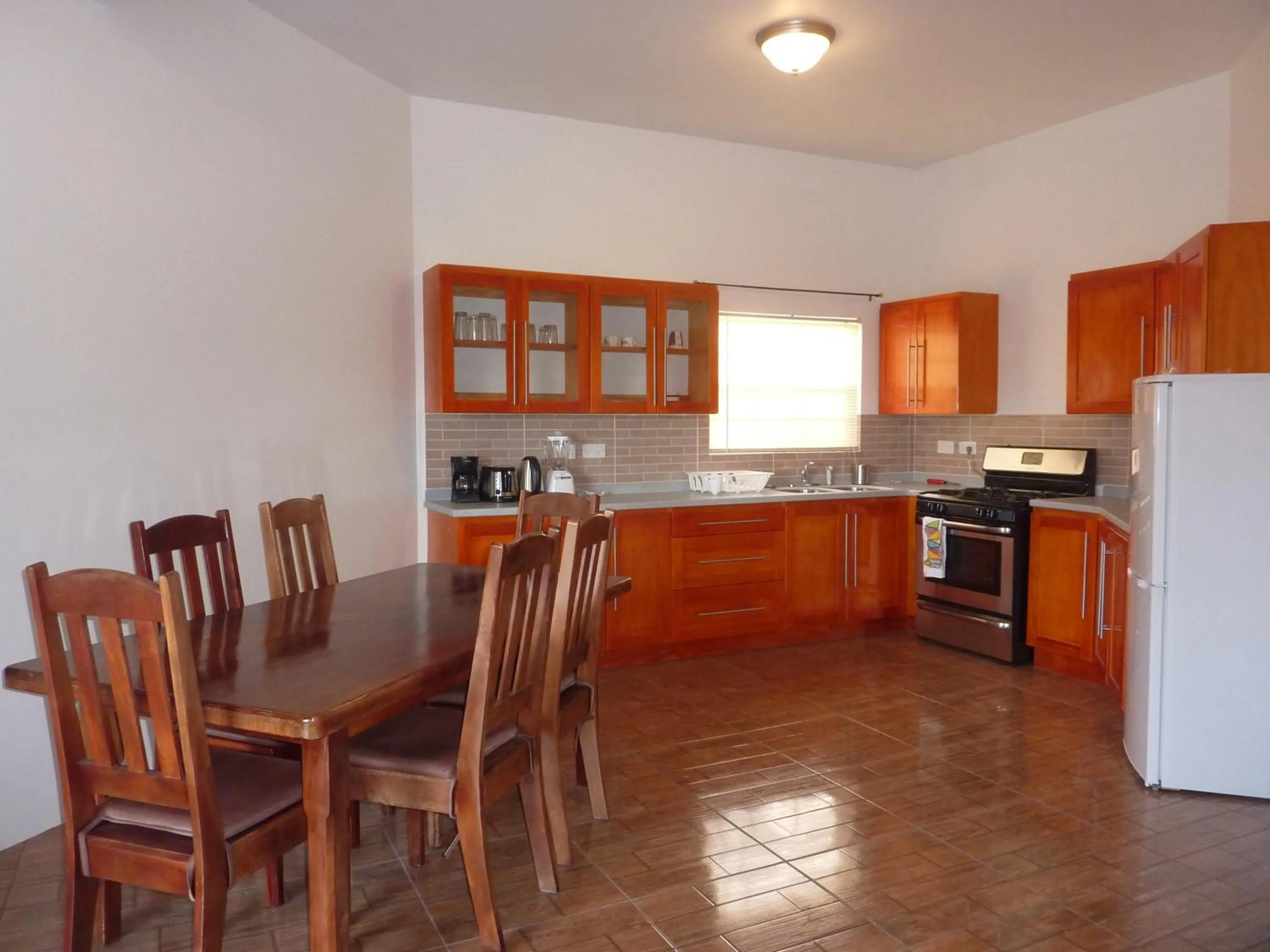 Kitchen or kitchenette in La Heliconia & Day Spa