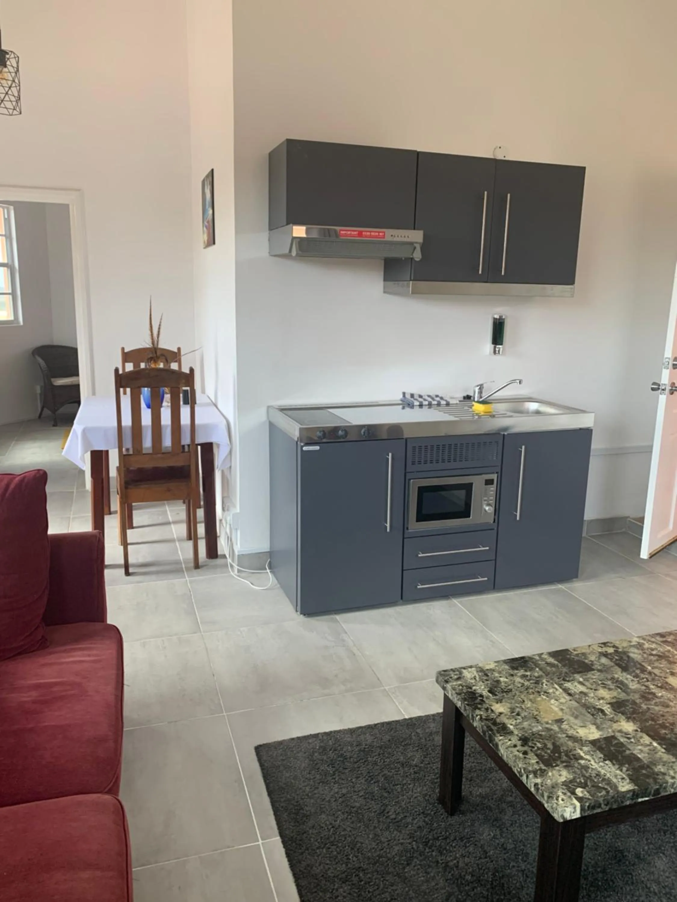 Kitchen or kitchenette in La Heliconia & Day Spa