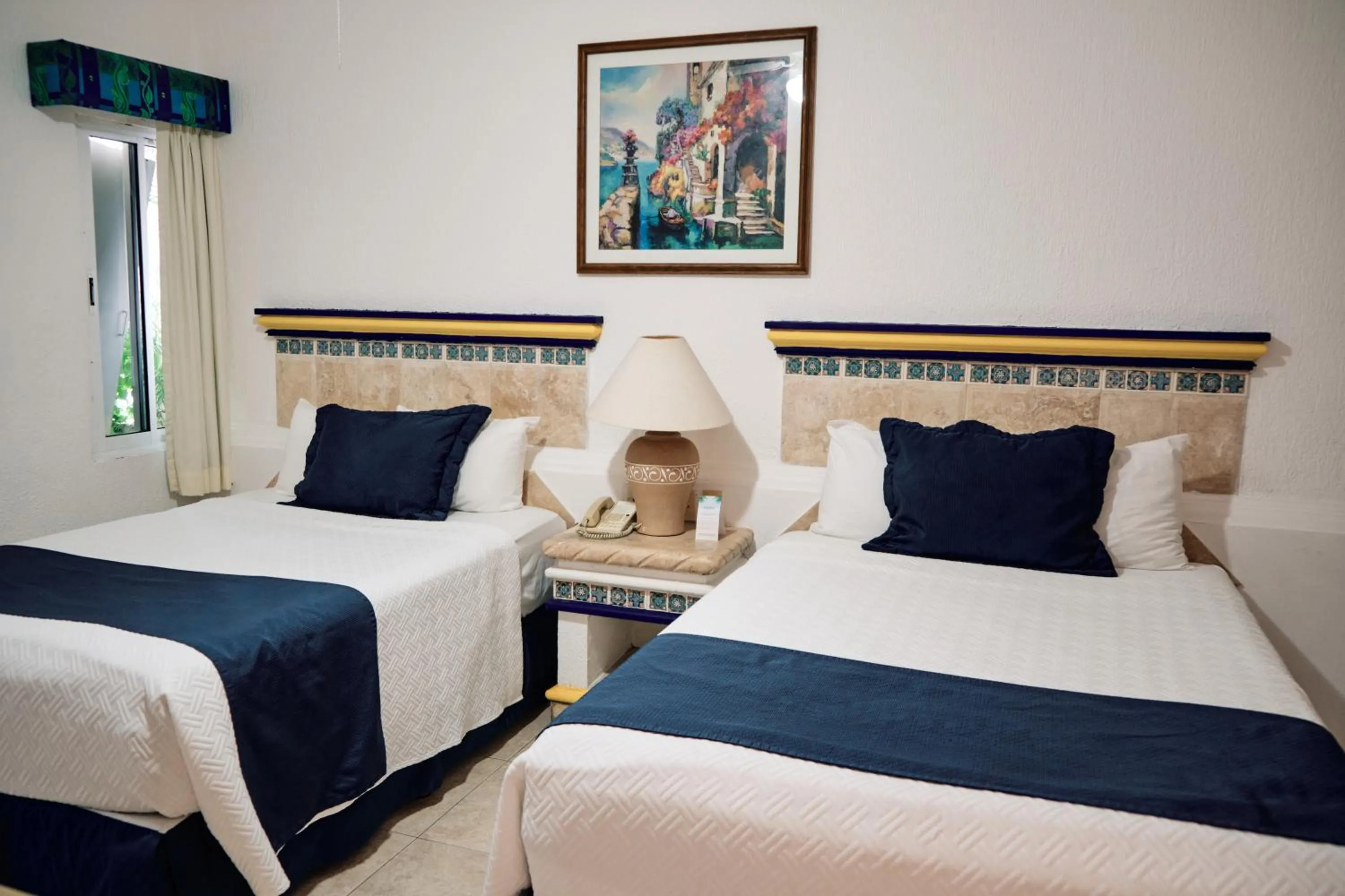 Bed in The Inn at Mazatlan