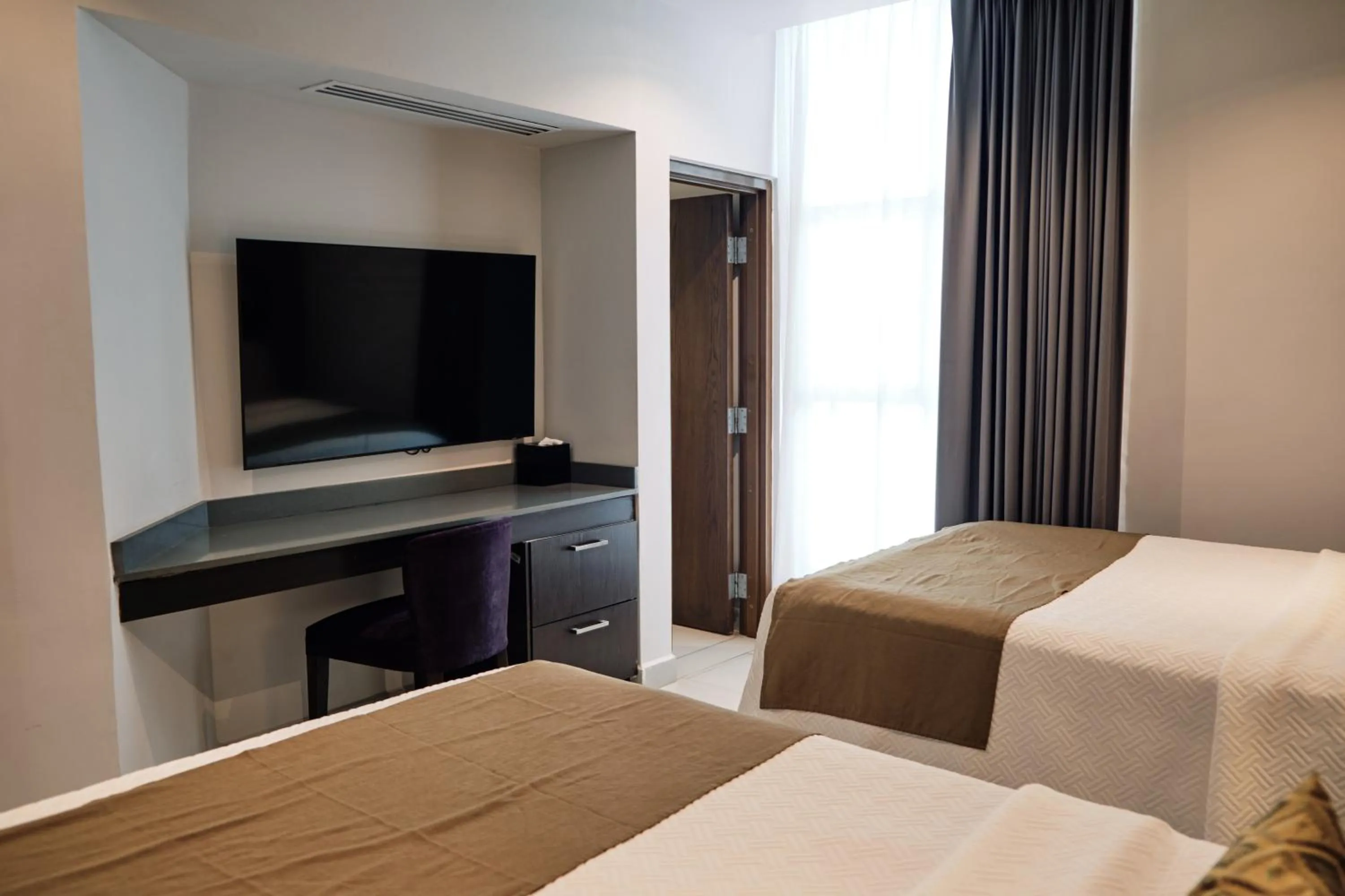 Bed in The Inn at Mazatlan