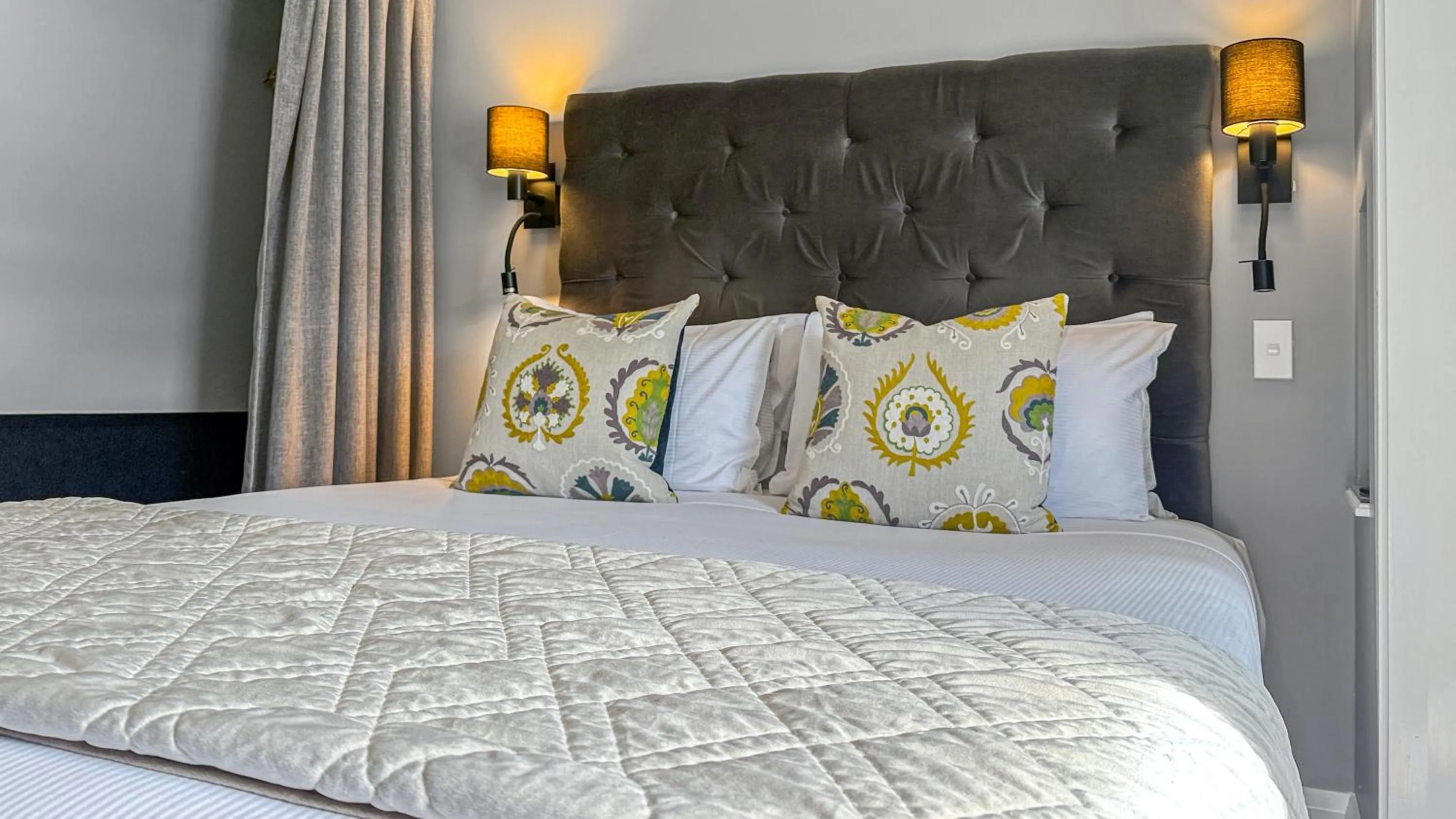 Bed in Art Deco Masonic Hotel