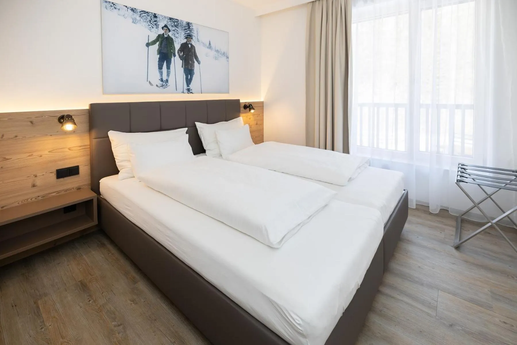 Bedroom in Dormio Aparthotel Hinterstoder