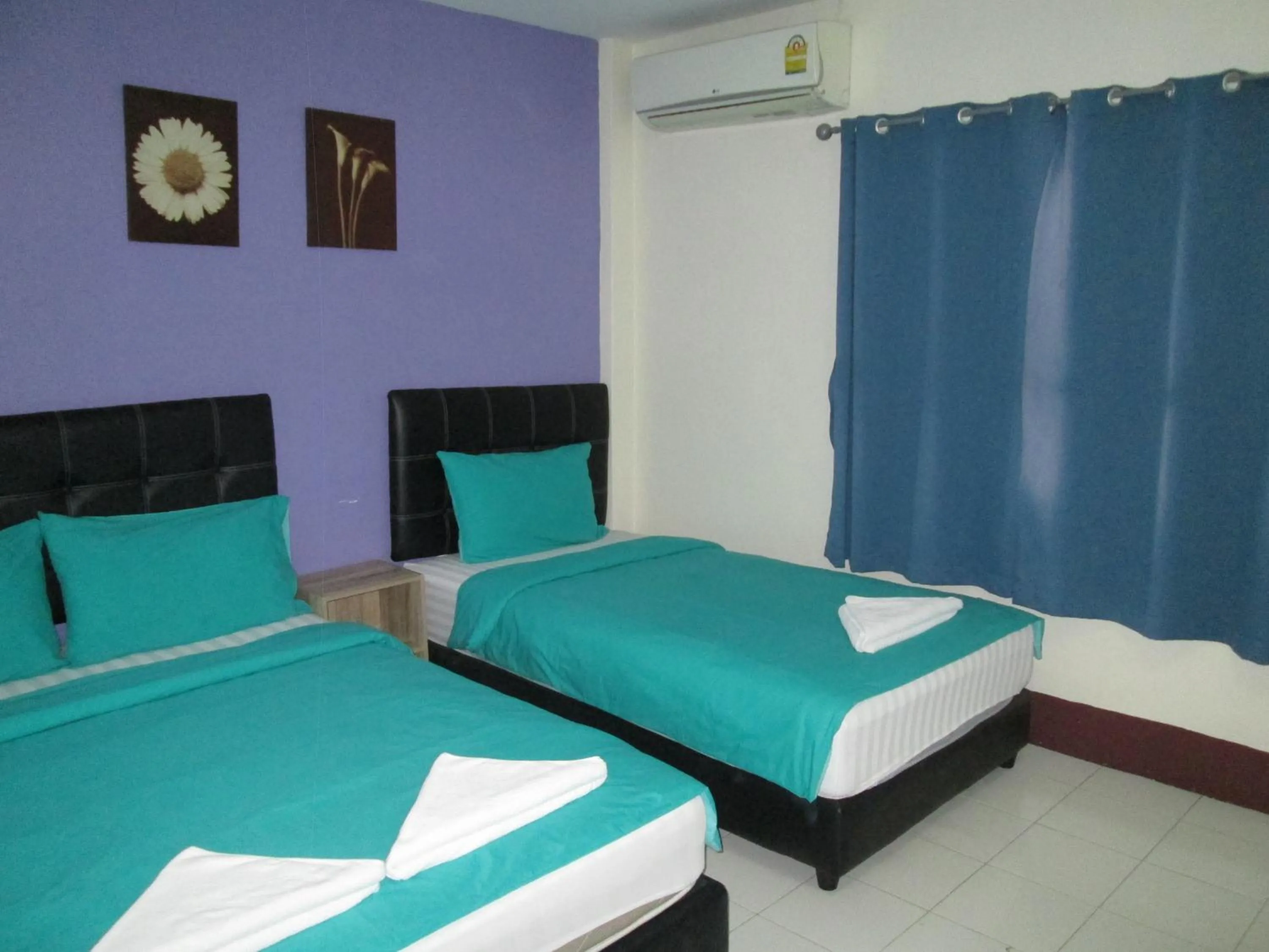 Bed in Pineapple Guesthouse