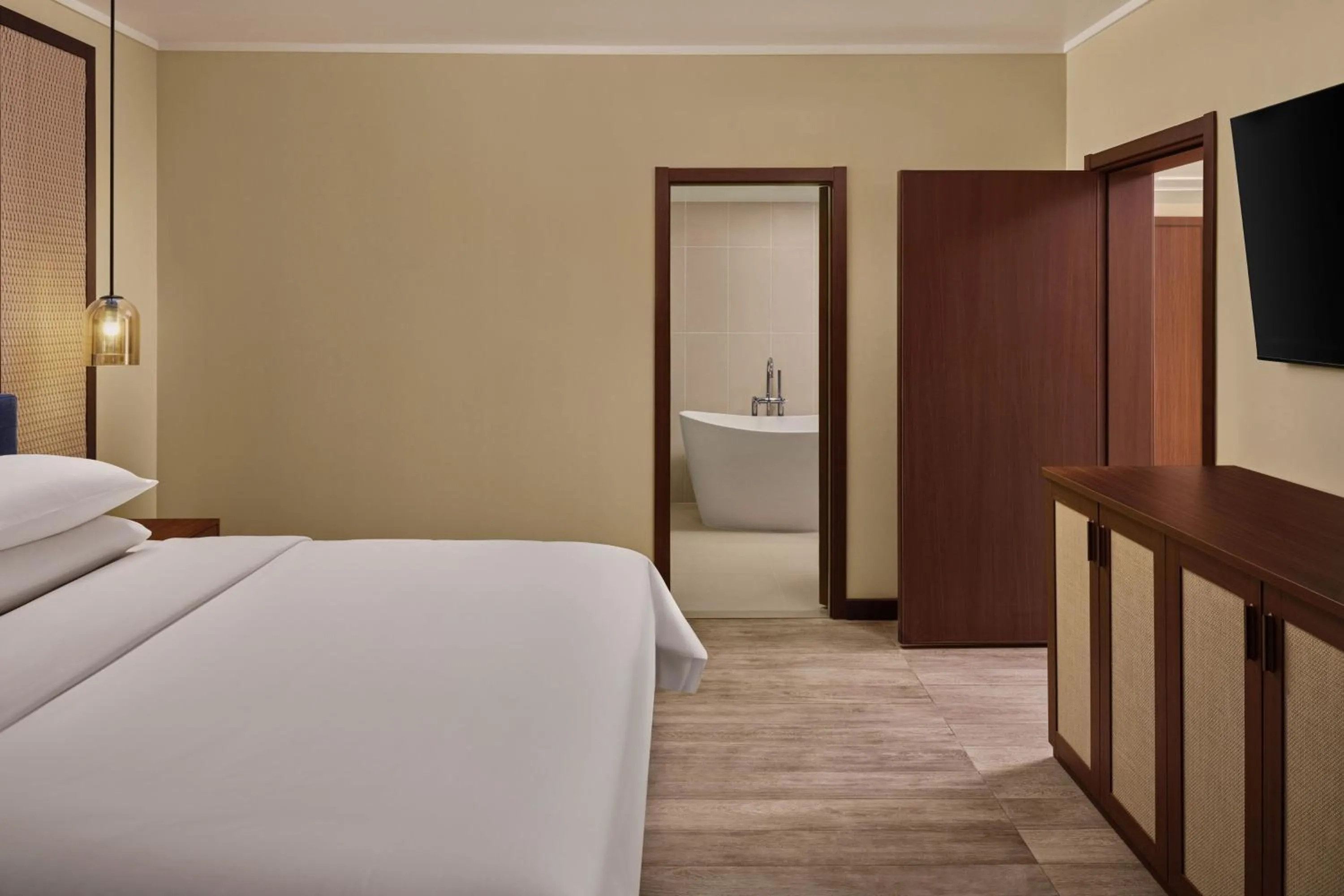 Photo of the whole room, Bed in Sheraton Samoa Beach Resort