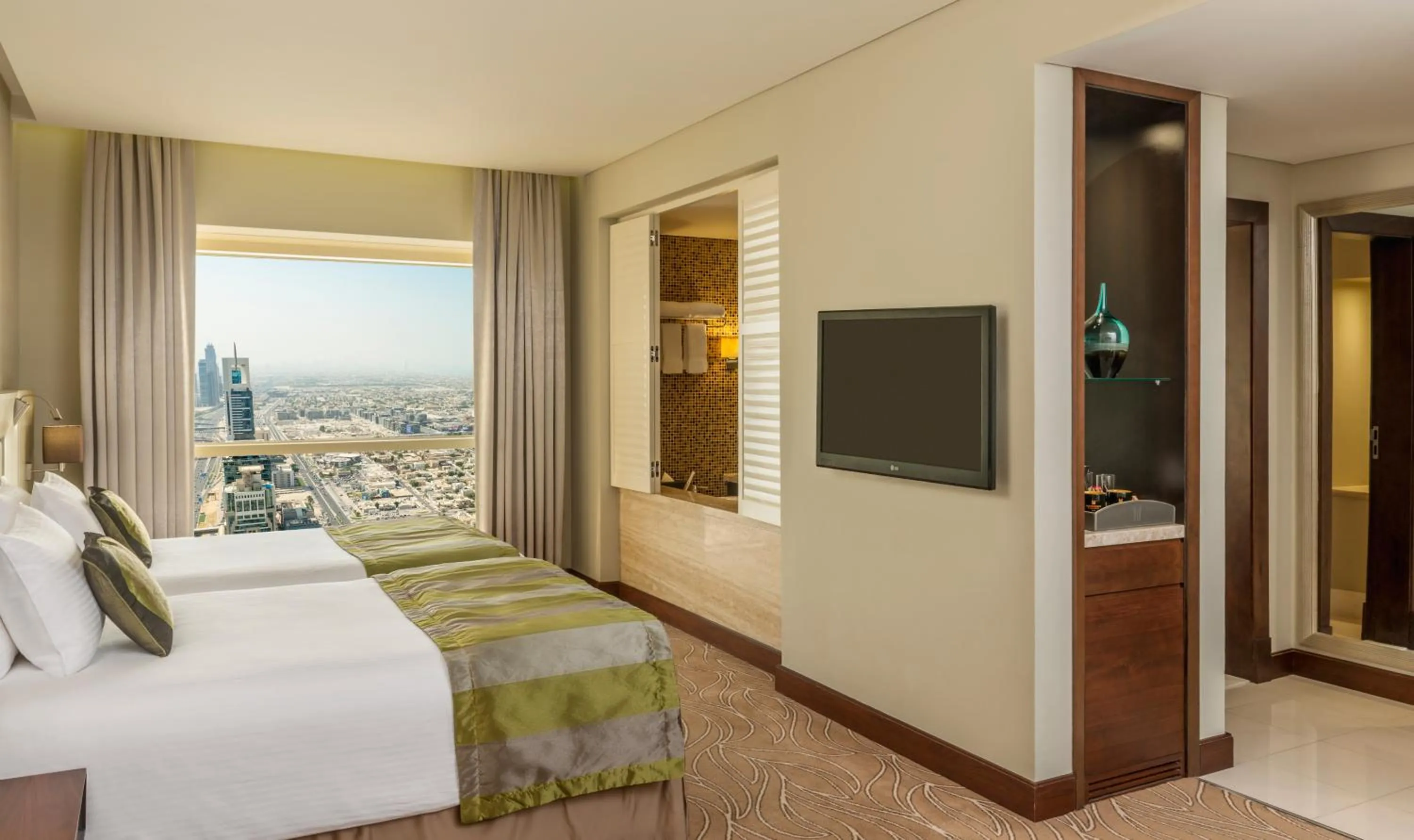 Bed in The Tower Plaza Hotel Dubai