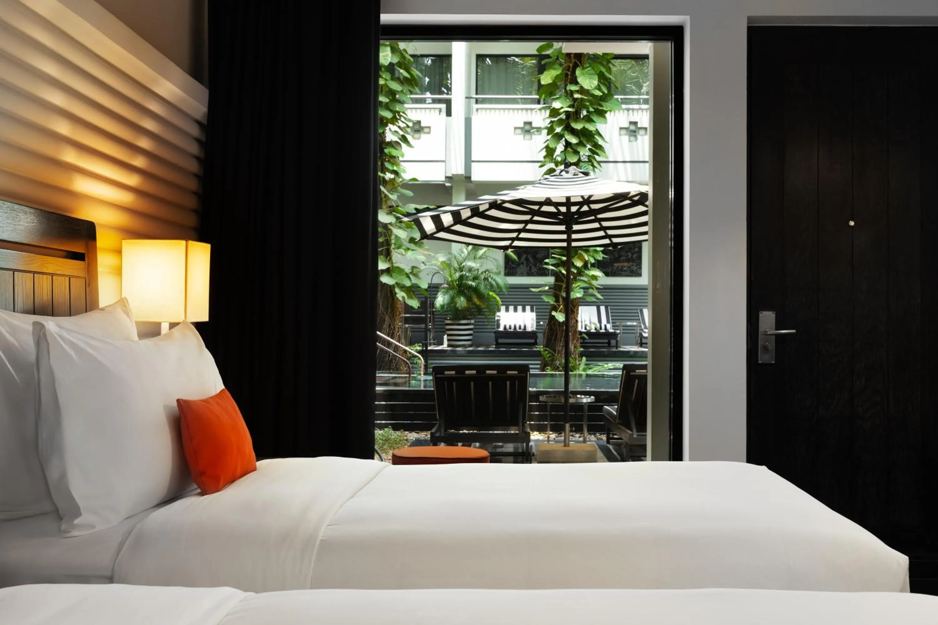 Pool view, Bed in Shinta Mani Angkor