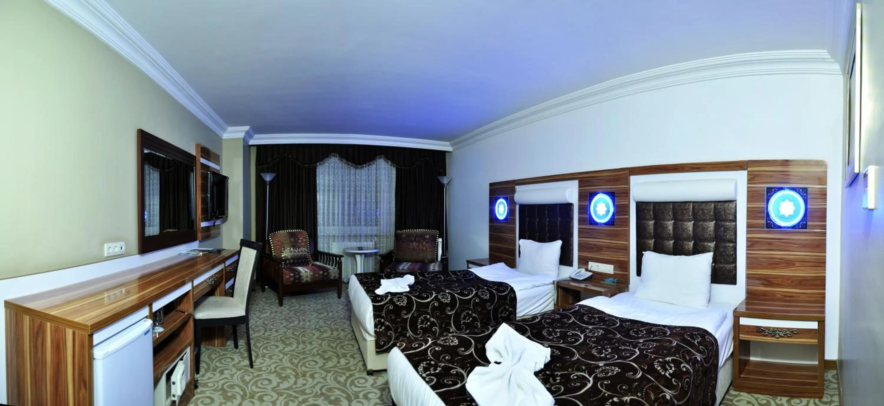 Bed in Demosan Hotel