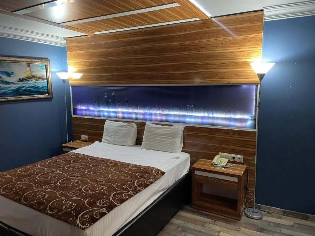 Bed in Demosan Hotel