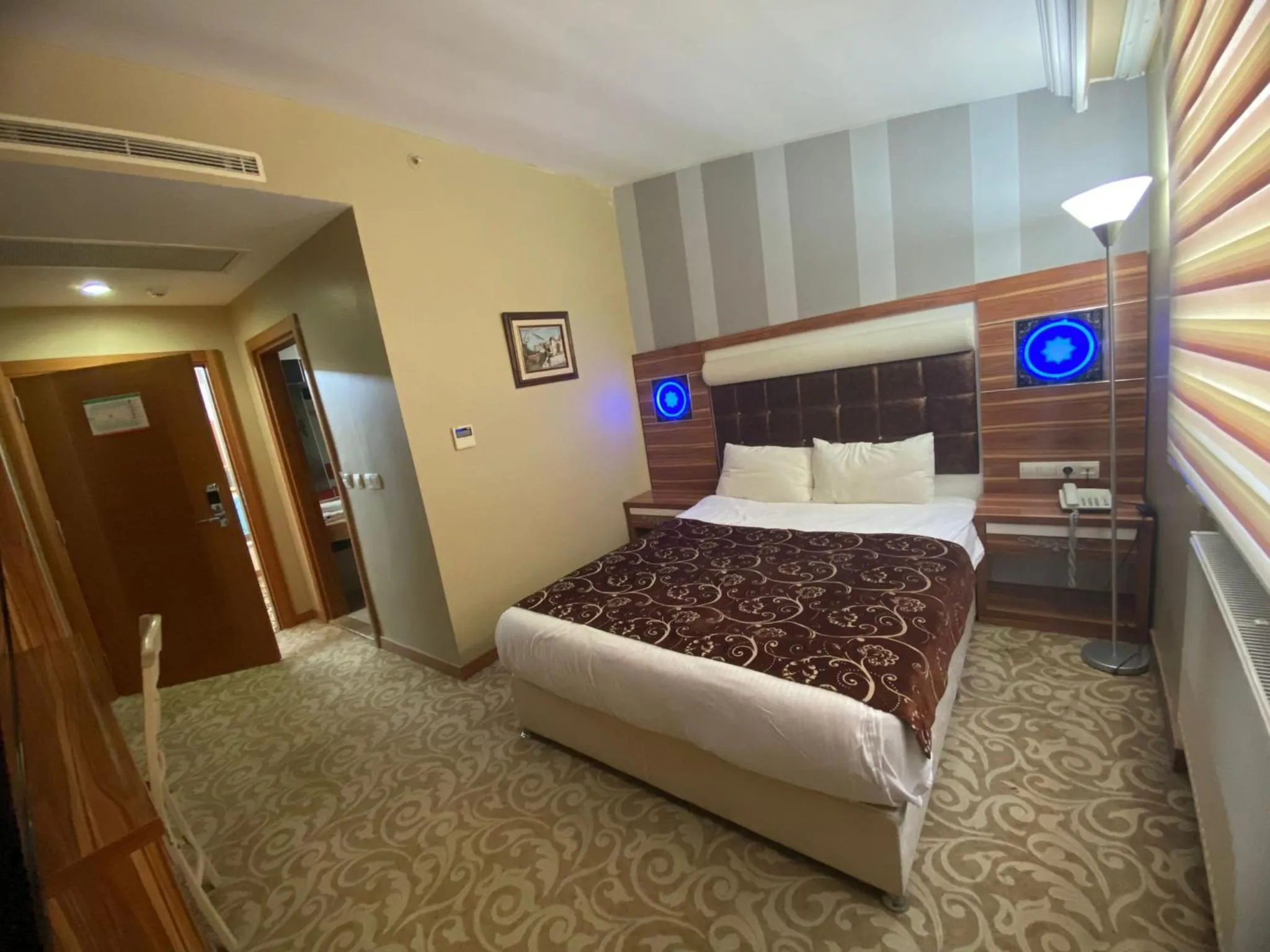 Bed in Demosan Hotel