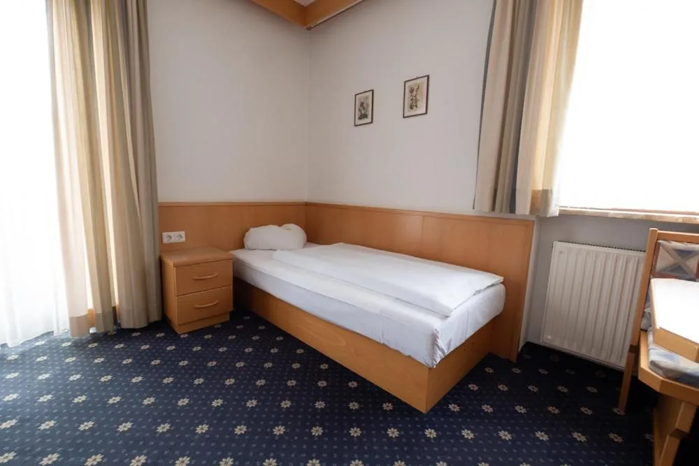 Photo of the whole room, Bed in Garni Volgger