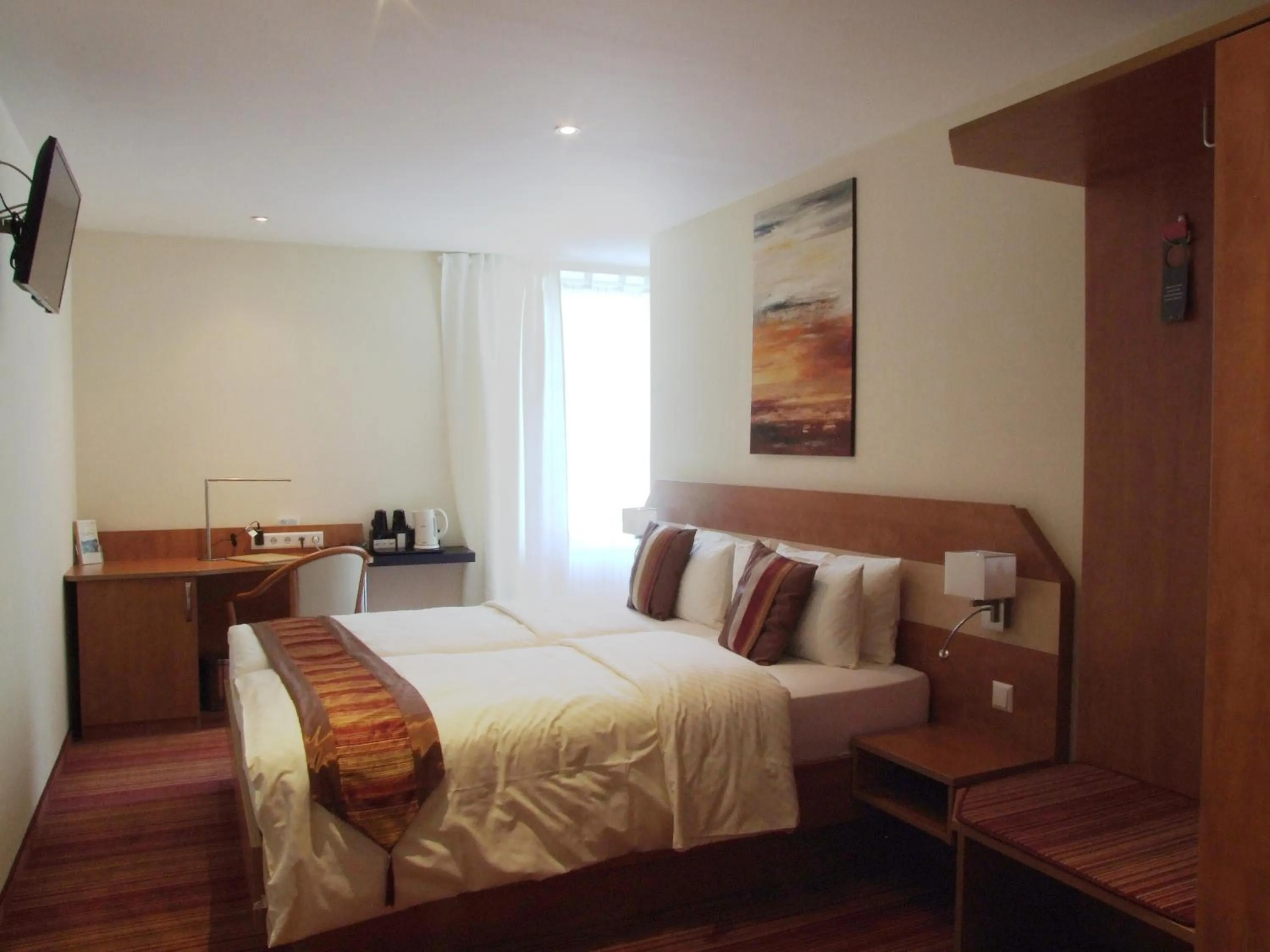 Photo of the whole room, Bed in Boutique Hotel Wolfsburg