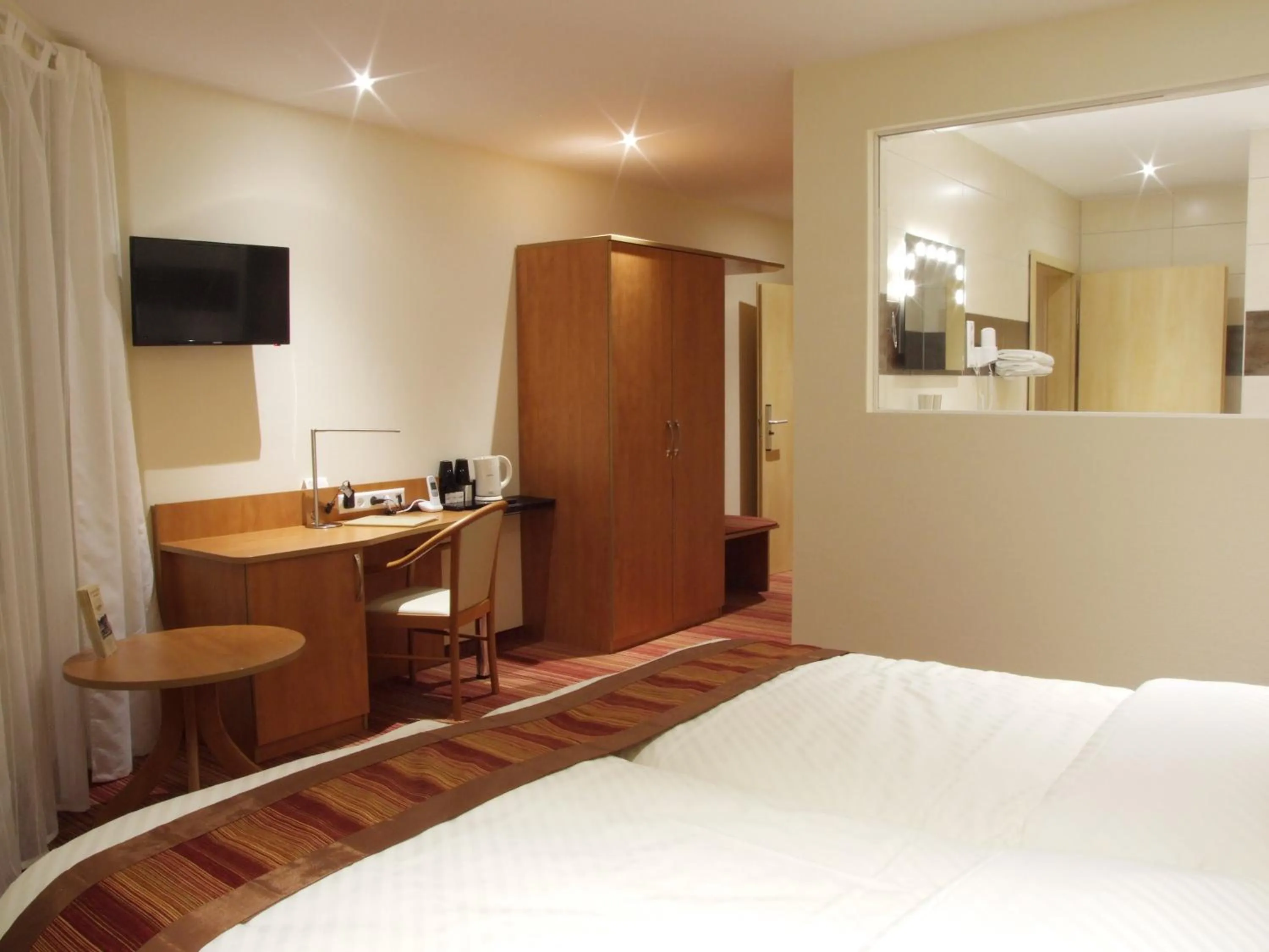 Photo of the whole room, Bed in Boutique Hotel Wolfsburg