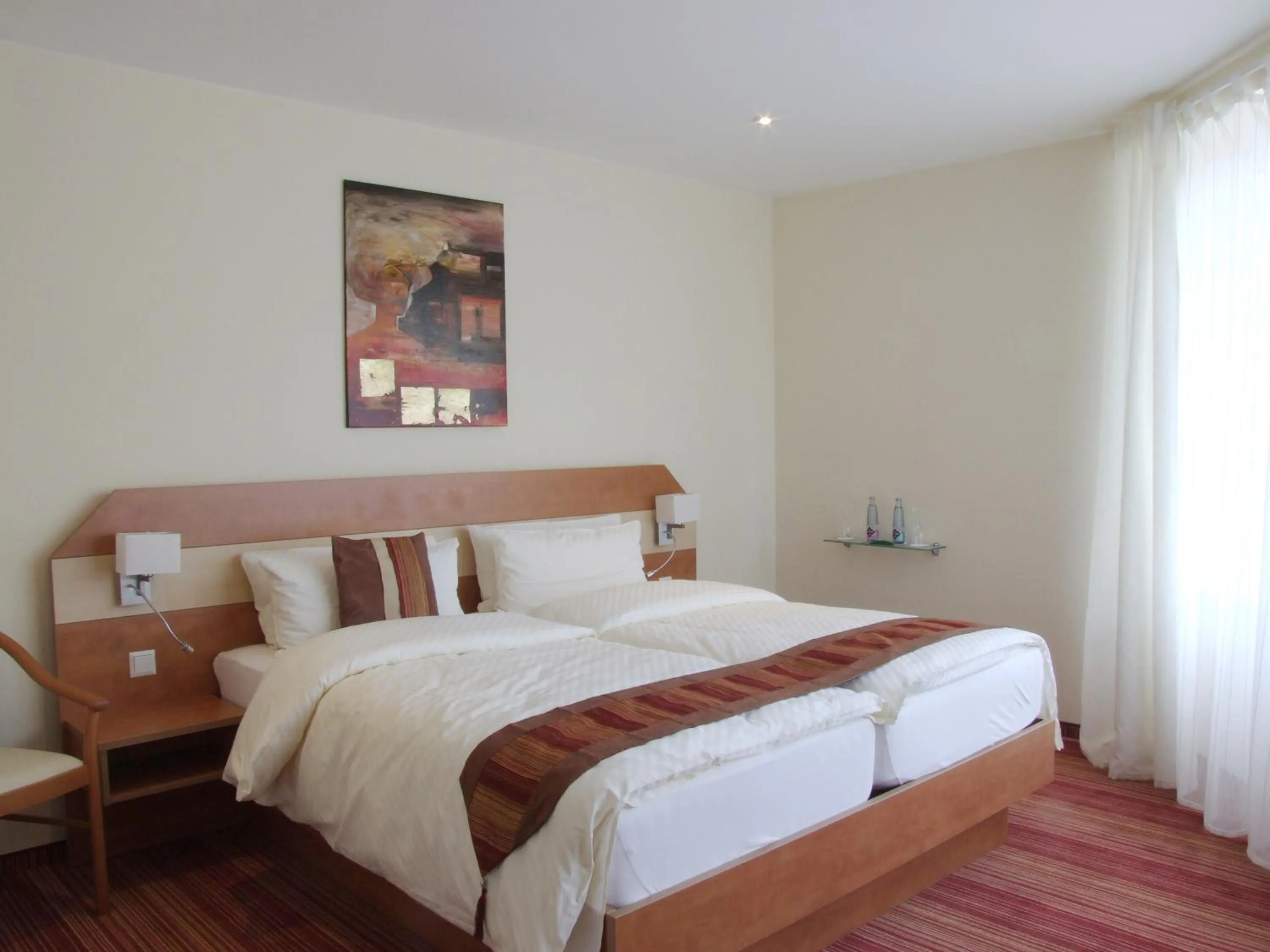 Photo of the whole room, Bed in Boutique Hotel Wolfsburg