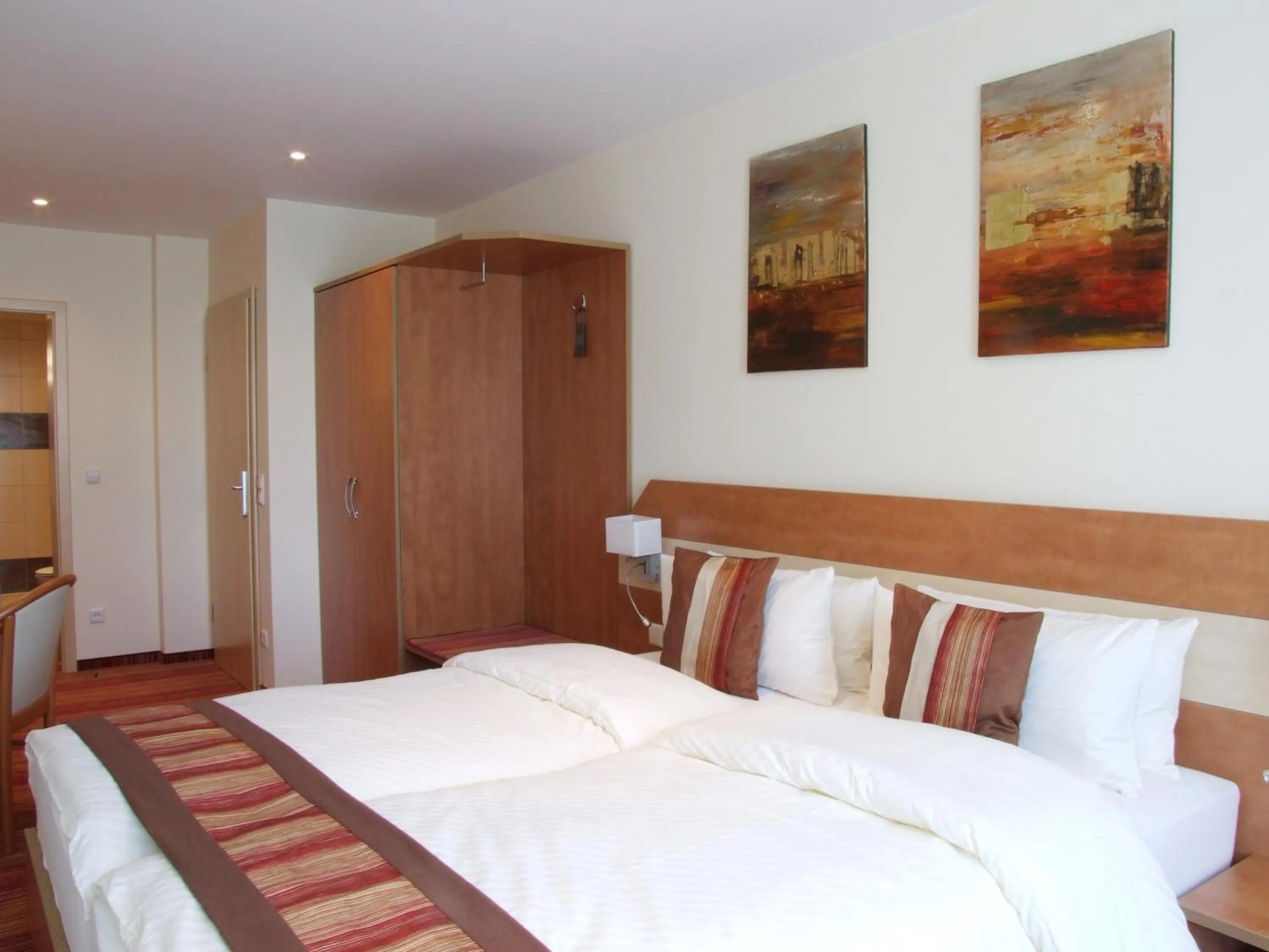 Photo of the whole room, Bed in Boutique Hotel Wolfsburg