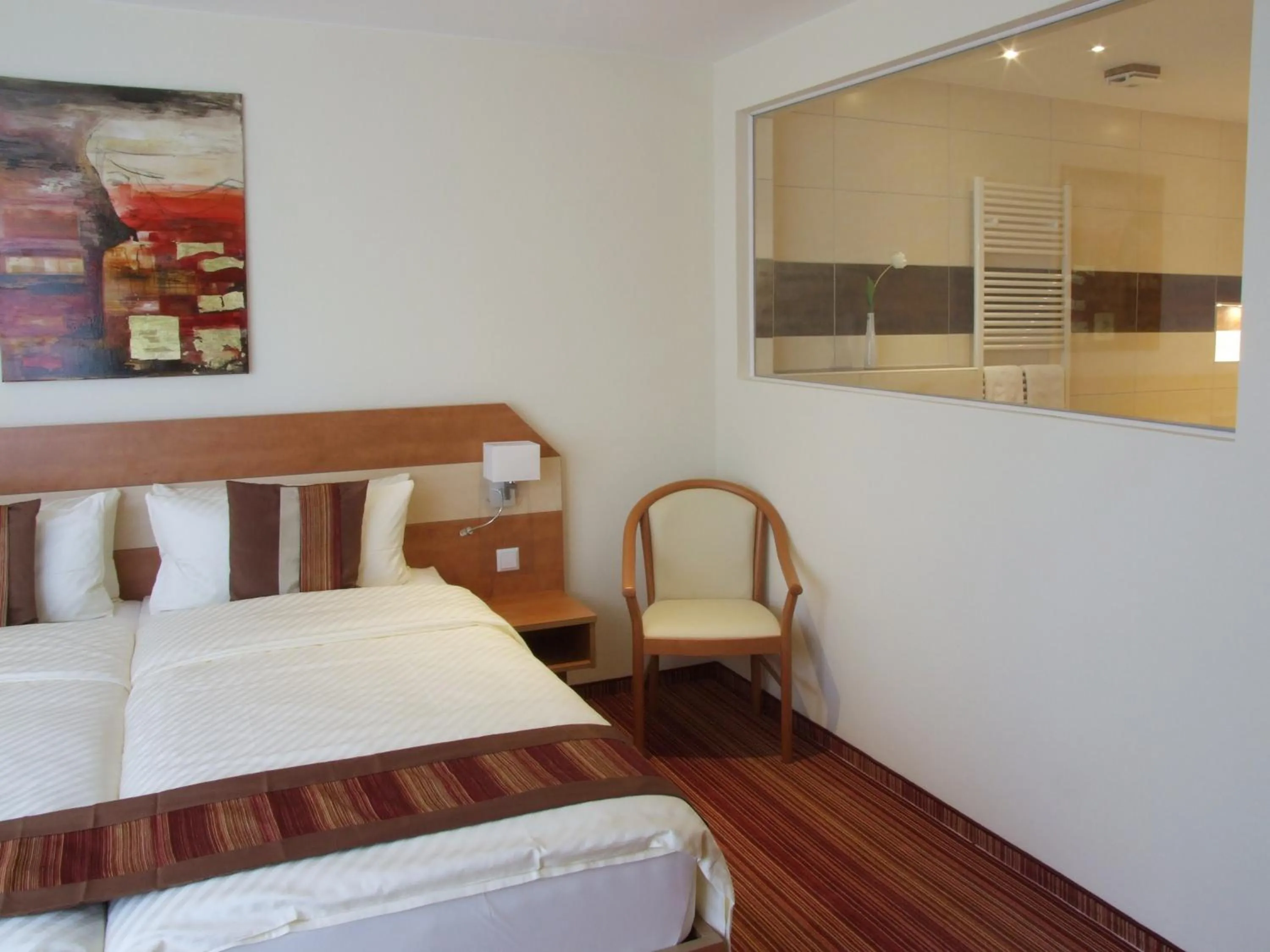 Photo of the whole room, Bed in Boutique Hotel Wolfsburg