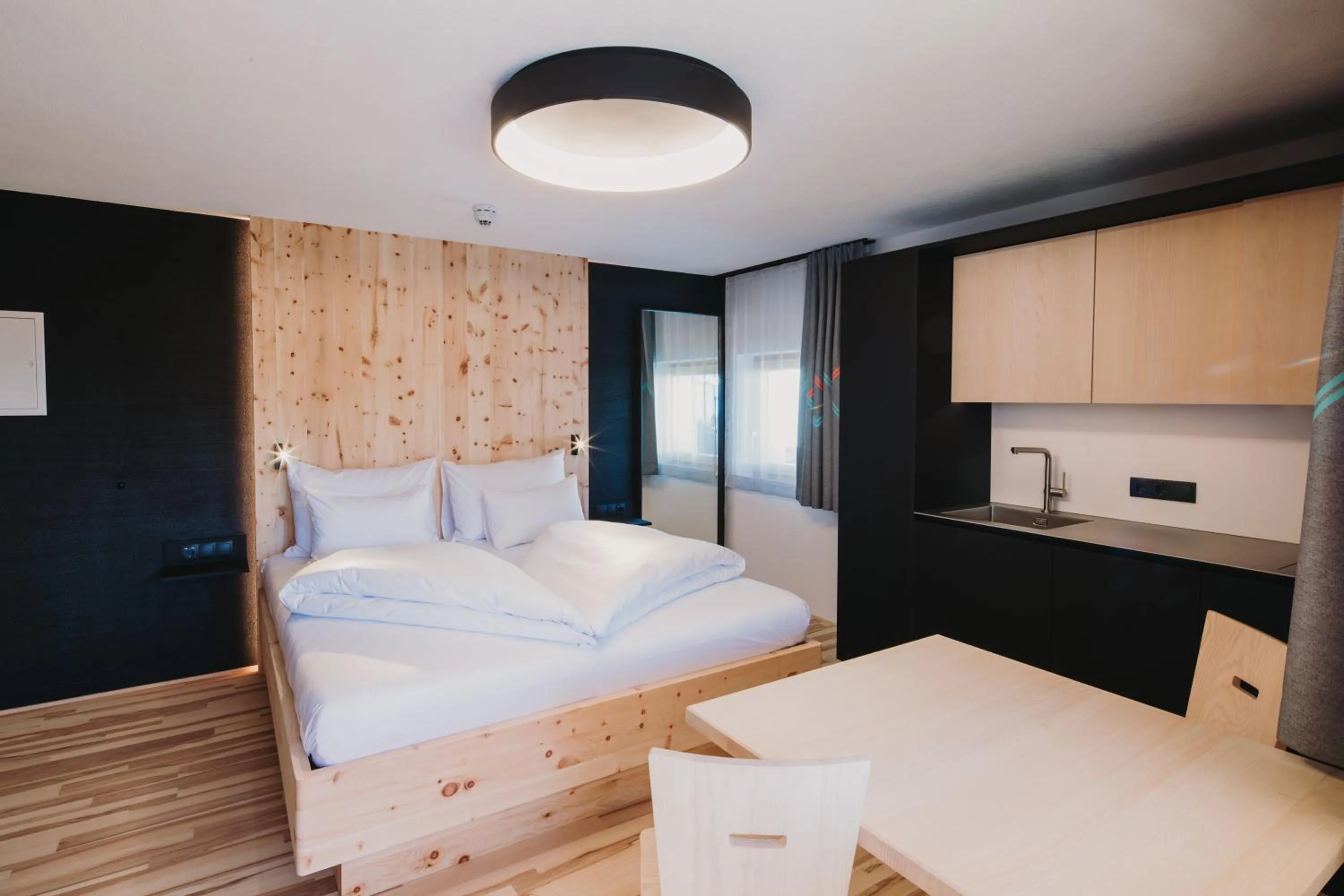 Photo of the whole room, Bed in Alpin - Studios & Suites