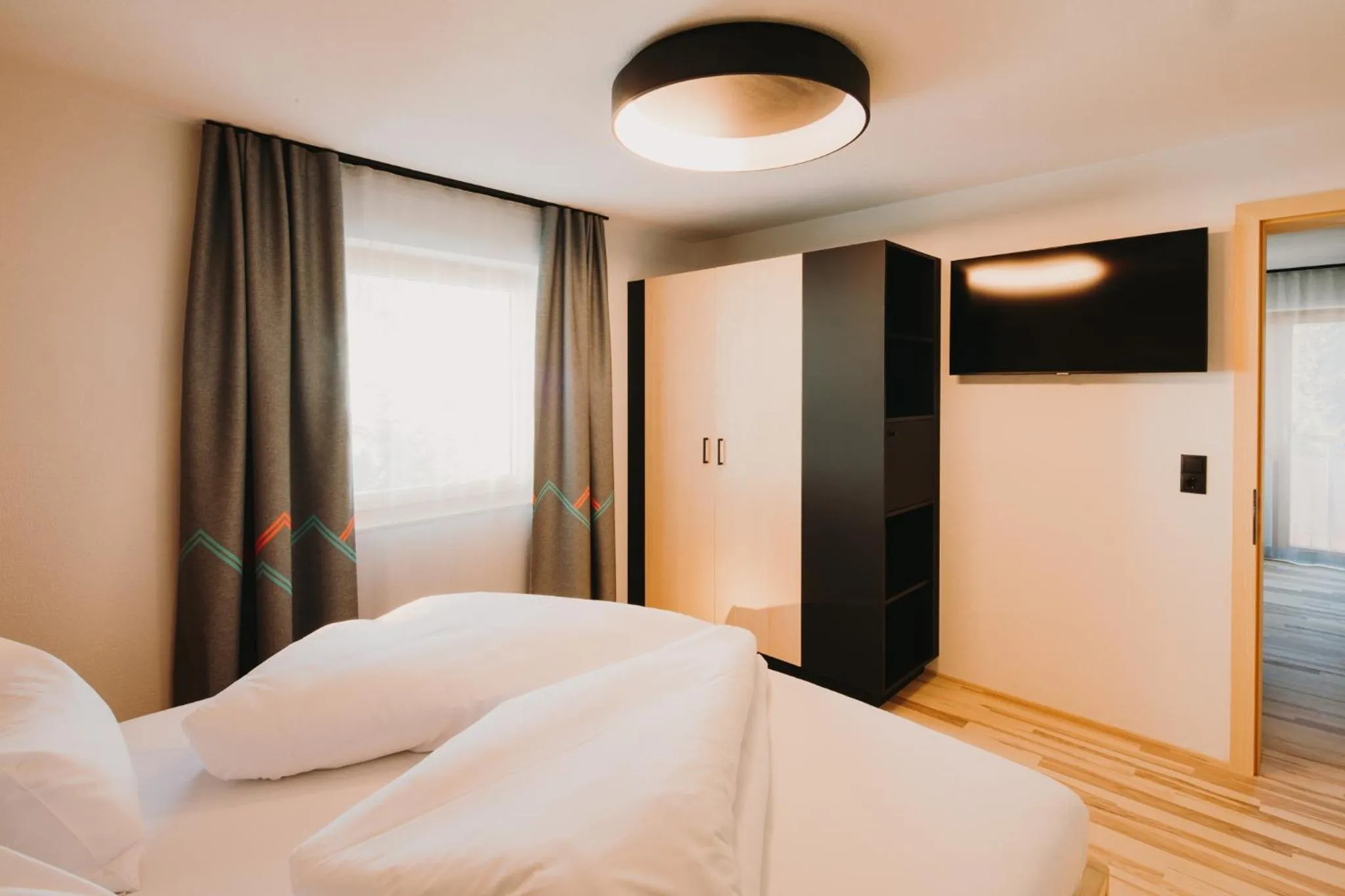 Photo of the whole room, Bed in Alpin - Studios & Suites