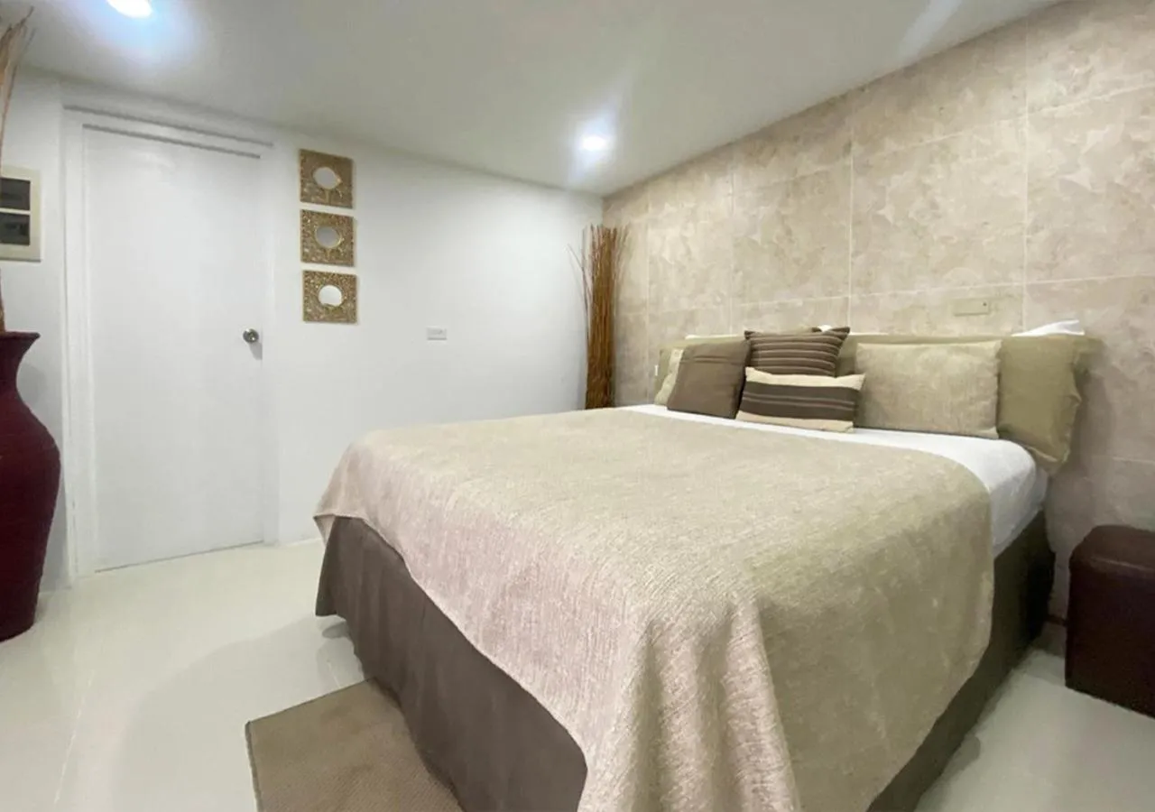 Bed in Yoyita Suites Aruba