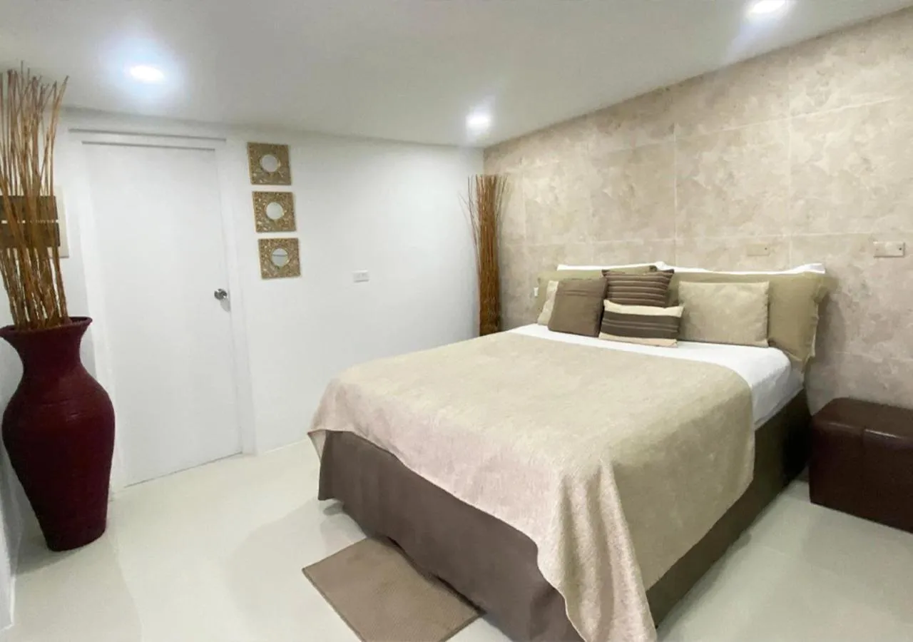 Bed in Yoyita Suites Aruba