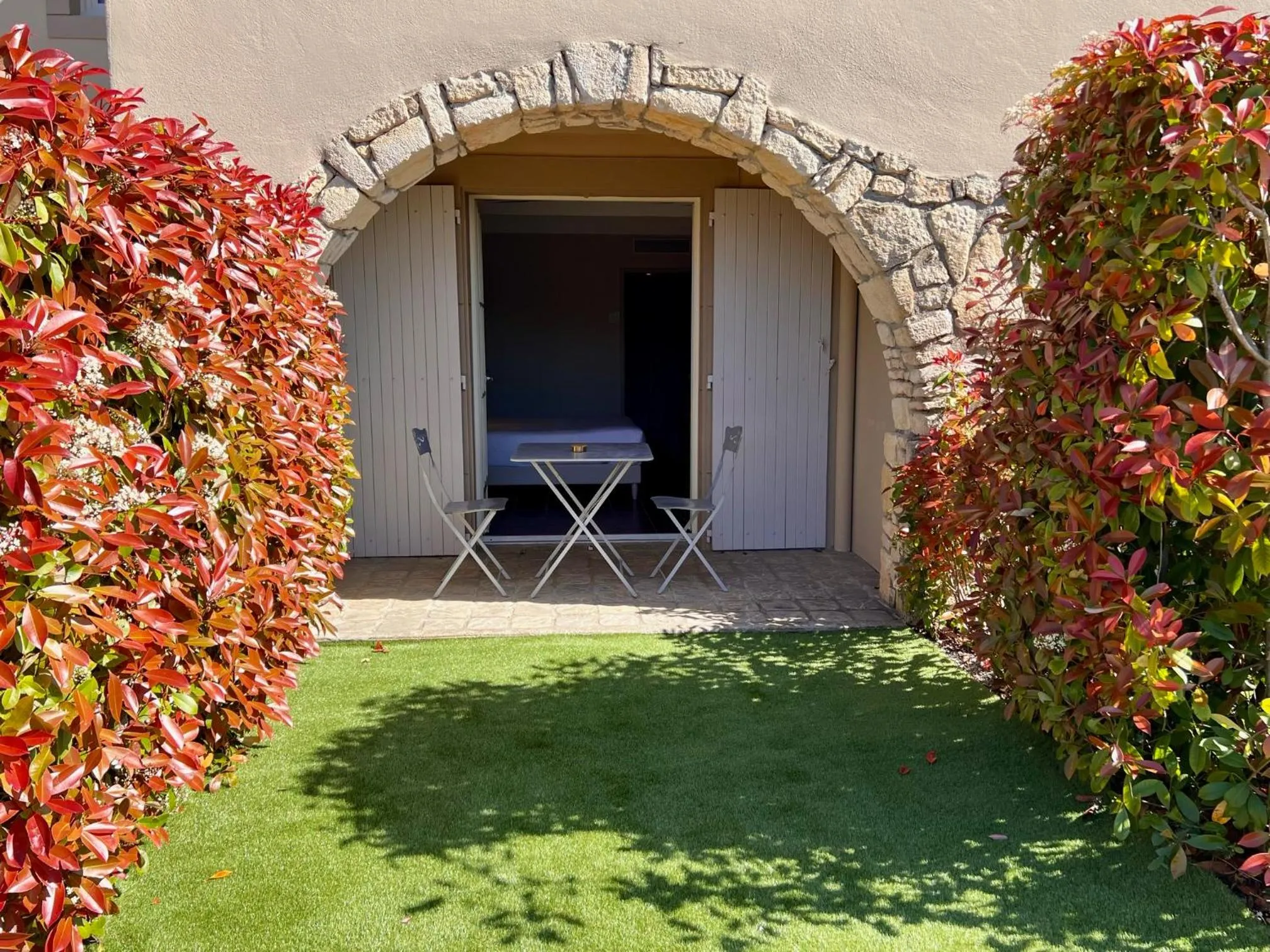 Patio in Logis Hôtel Restaurant La Bergerie