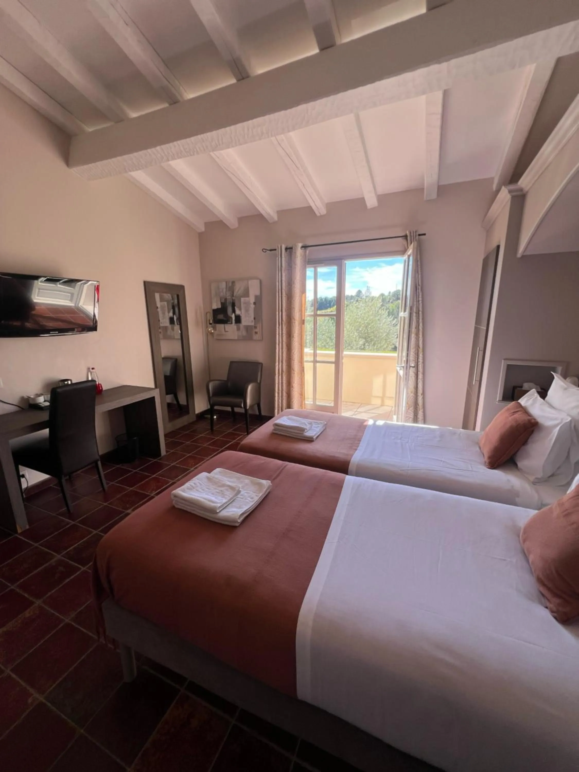 Photo of the whole room, Bed in Logis Hôtel Restaurant La Bergerie