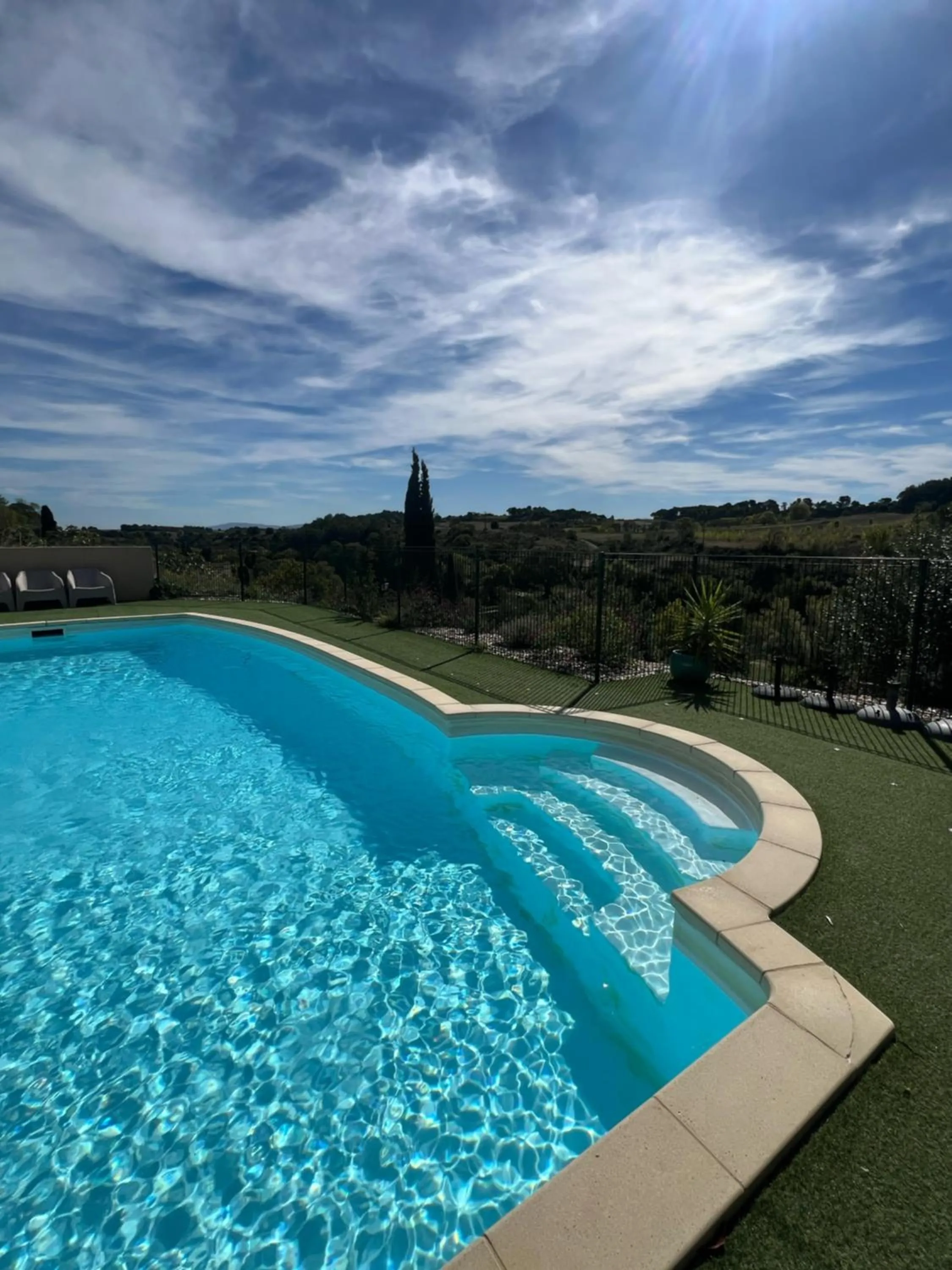 Pool view in Logis Hôtel Restaurant La Bergerie