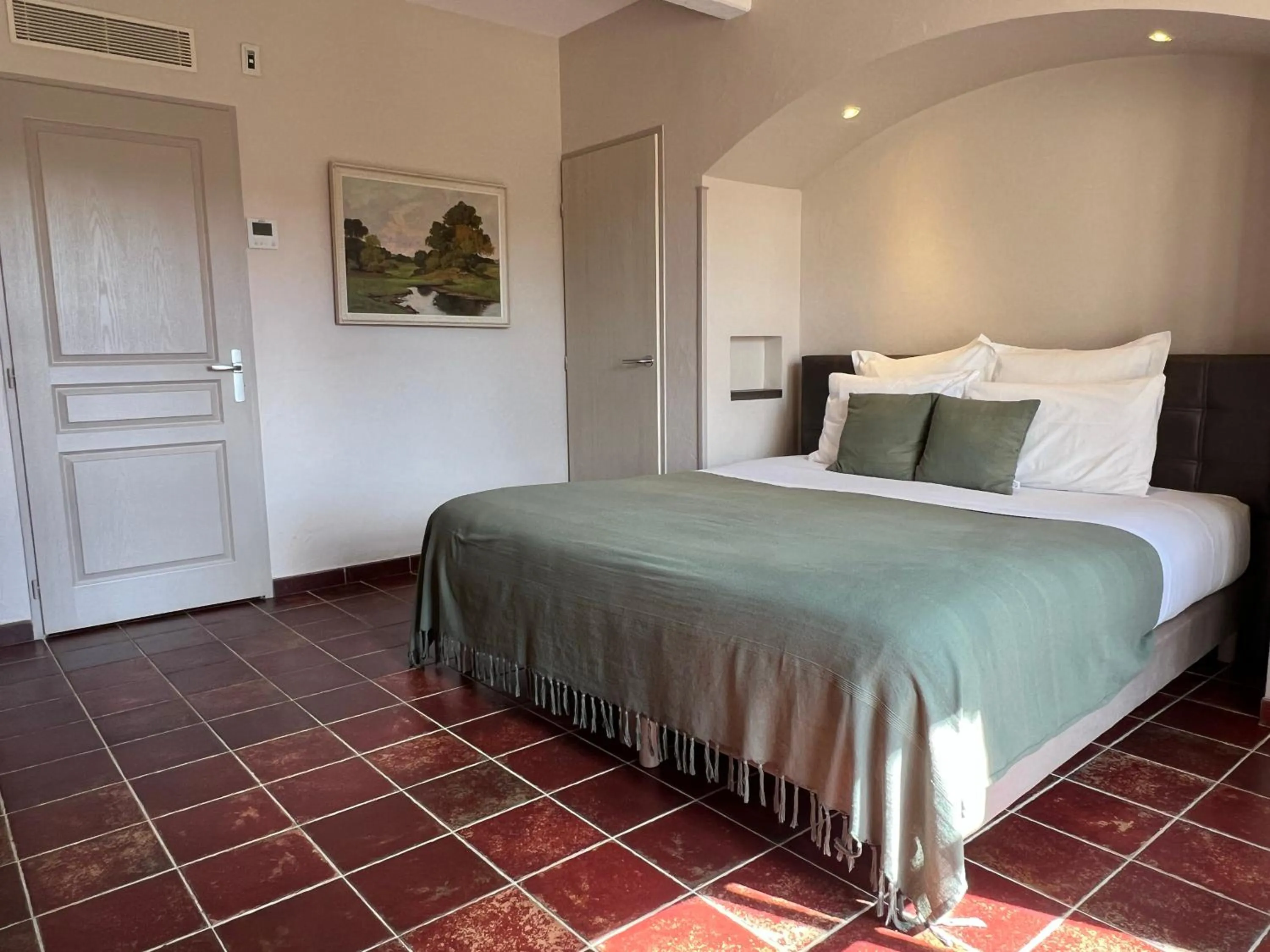 Bed in Logis Hôtel Restaurant La Bergerie