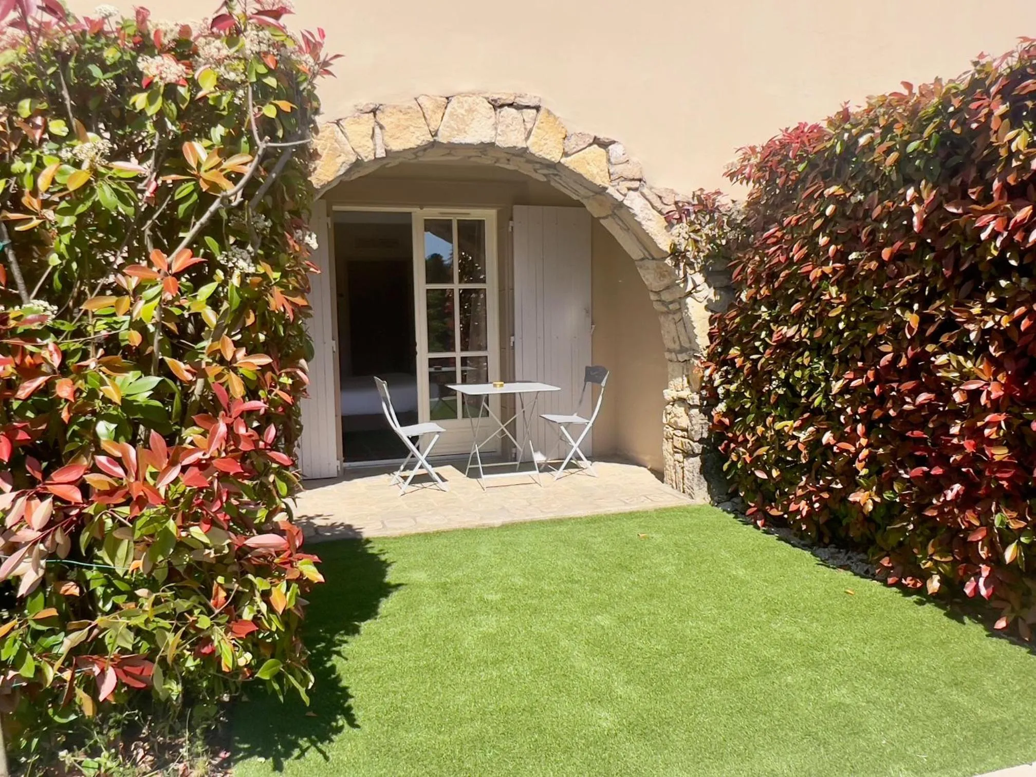 Patio in Logis Hôtel Restaurant La Bergerie