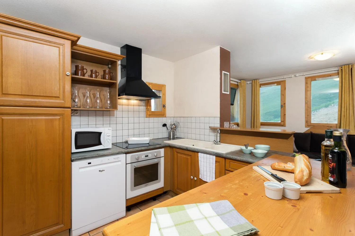 Kitchen or kitchenette in Madame Vacances les Chalets des Alpages