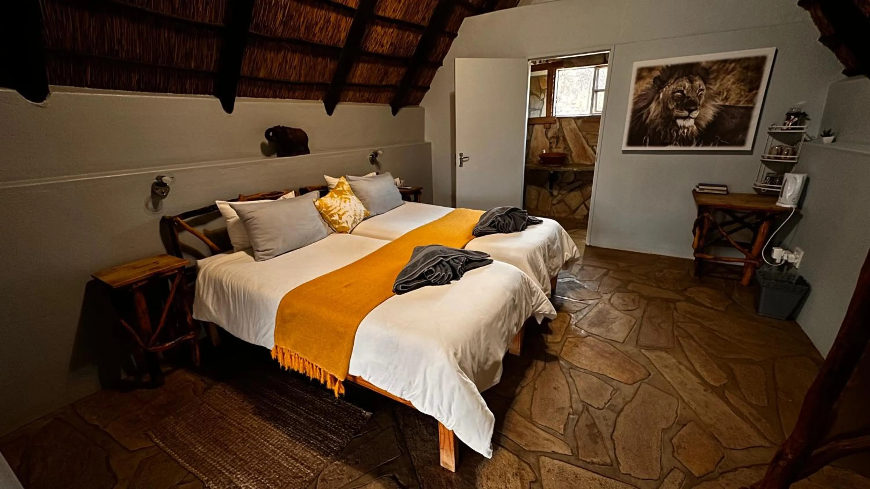 Bed in Ohange Namibia Lodge