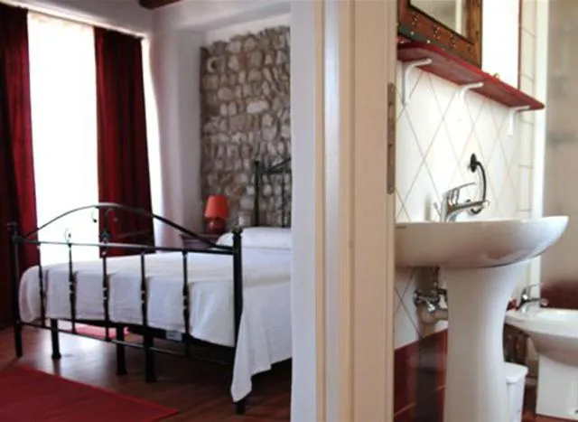 Photo of the whole room, Bed in Albergo Julienne