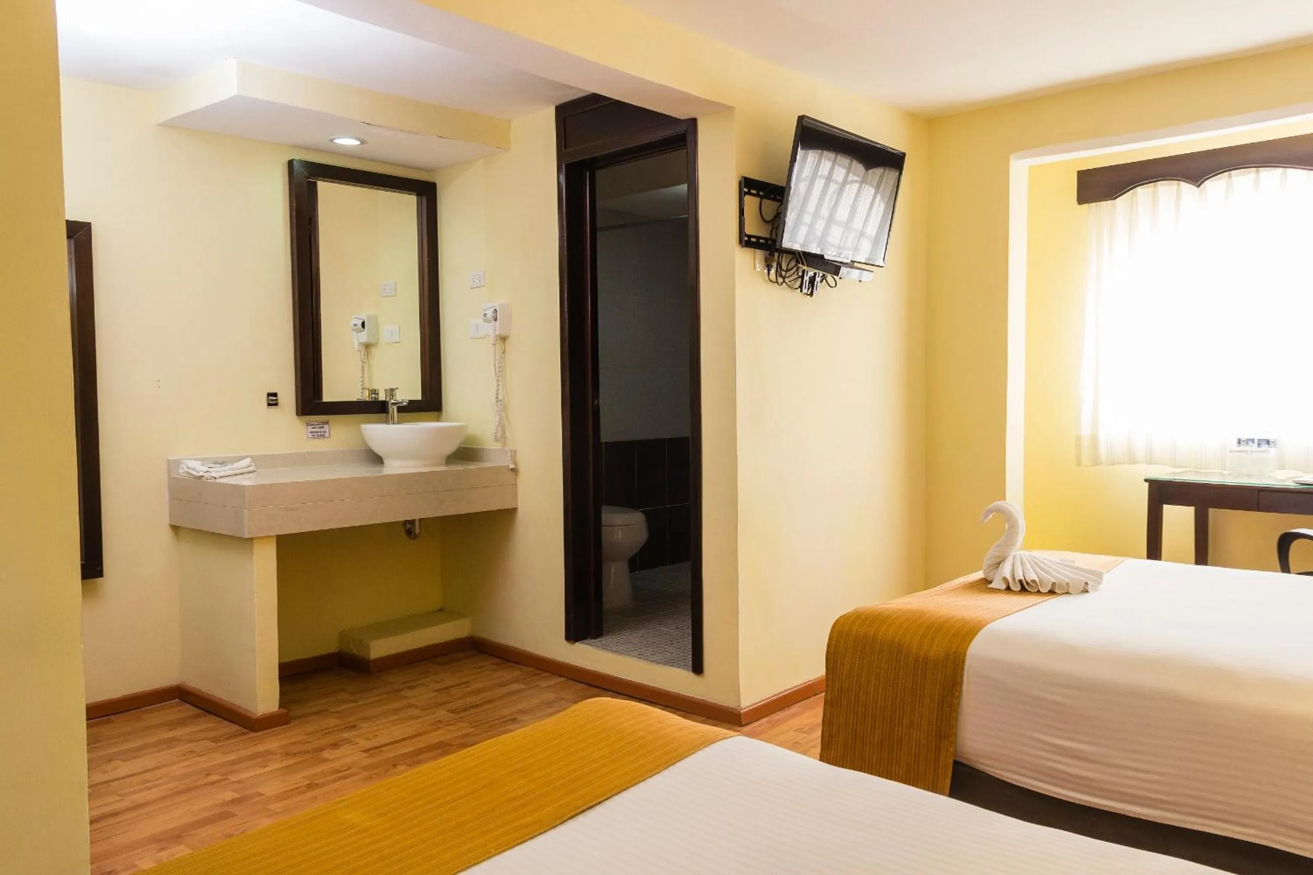 Bed in Hotel Madan Cárdenas