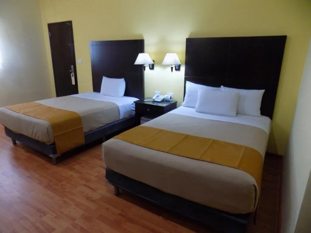 Bed in Hotel Madan Cárdenas