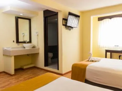 Bed in Hotel Madan Cárdenas