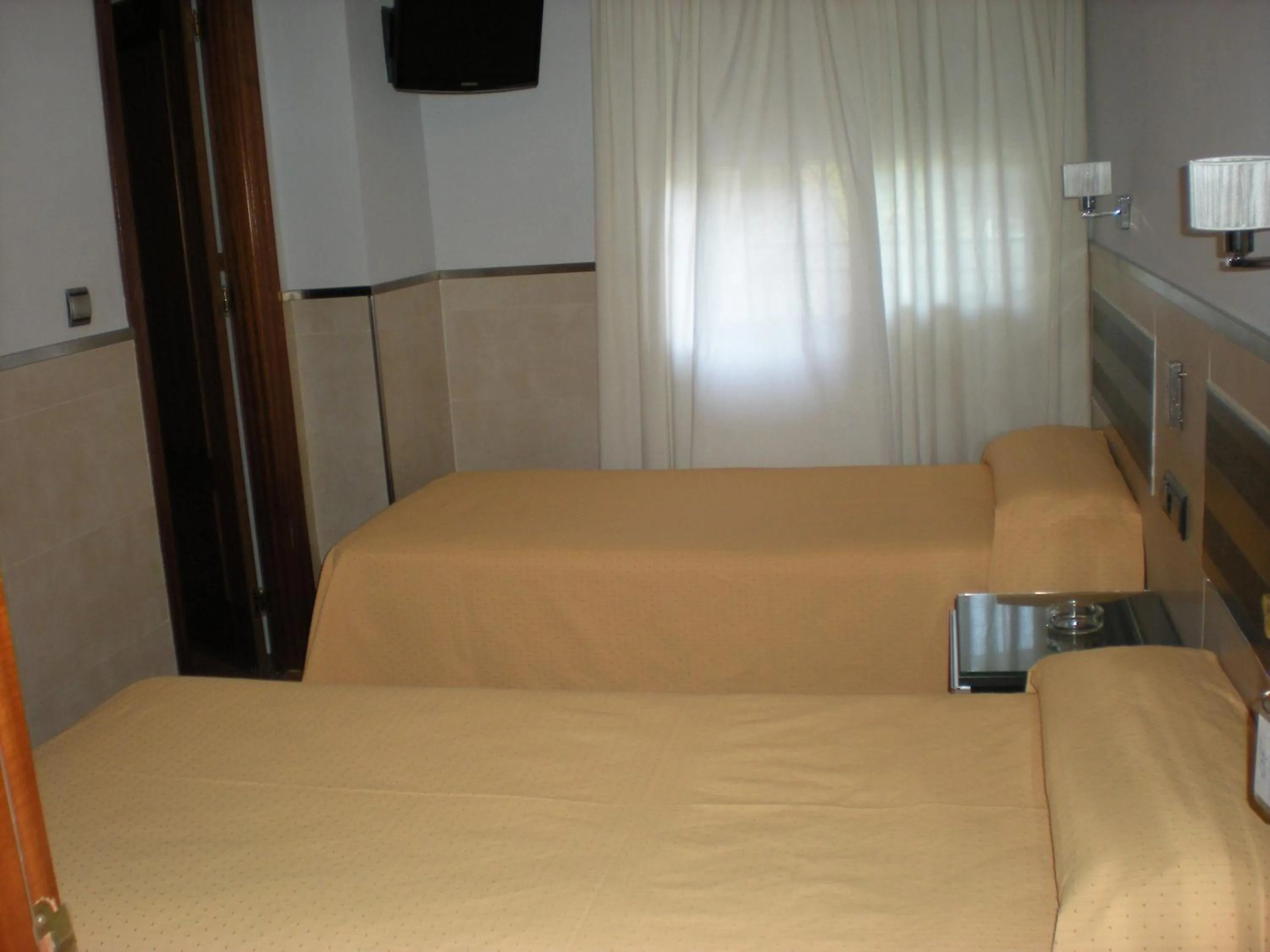 Photo of the whole room, Bed in Hostal La Hispanidad