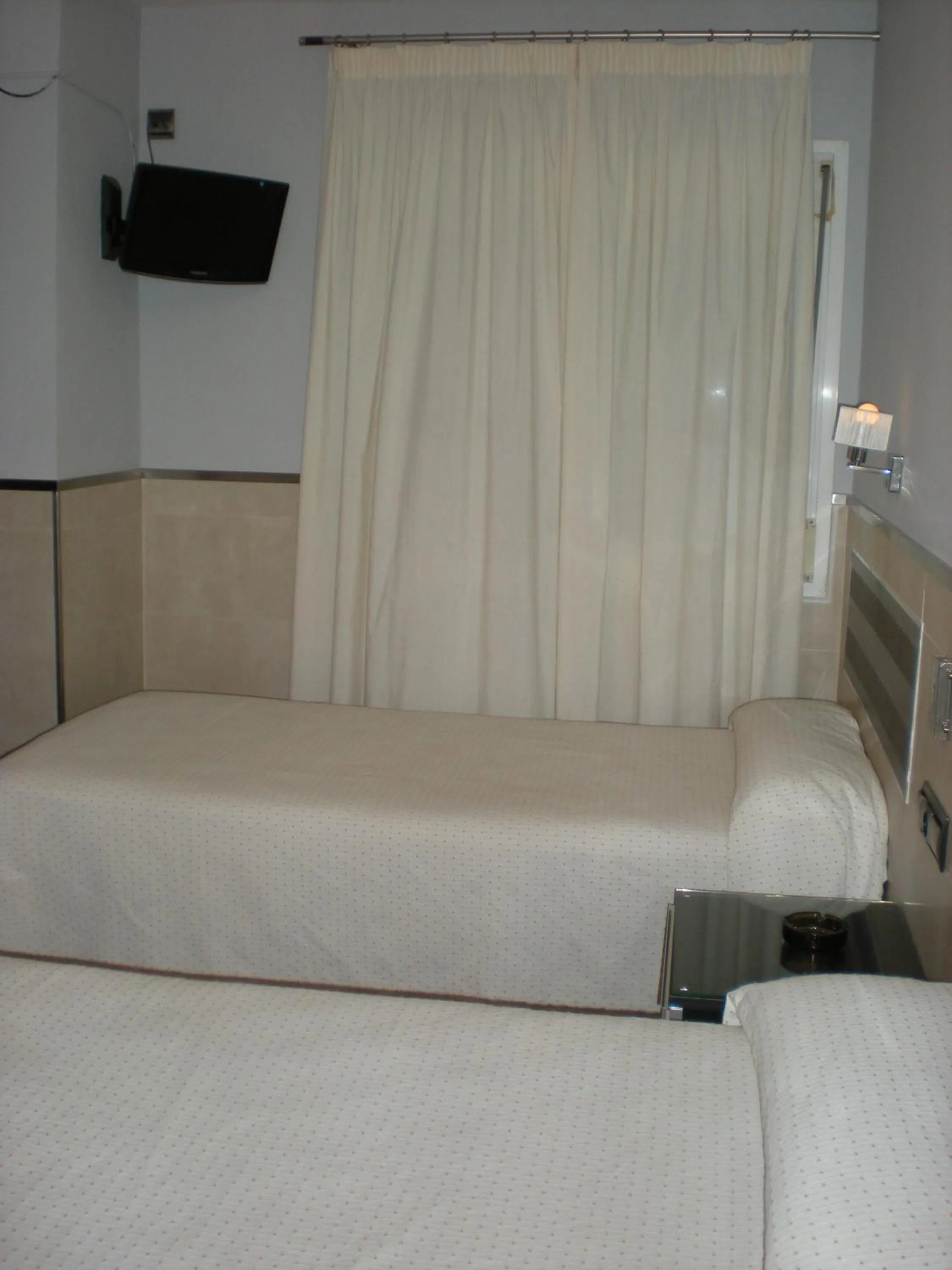 Photo of the whole room, Bed in Hostal La Hispanidad