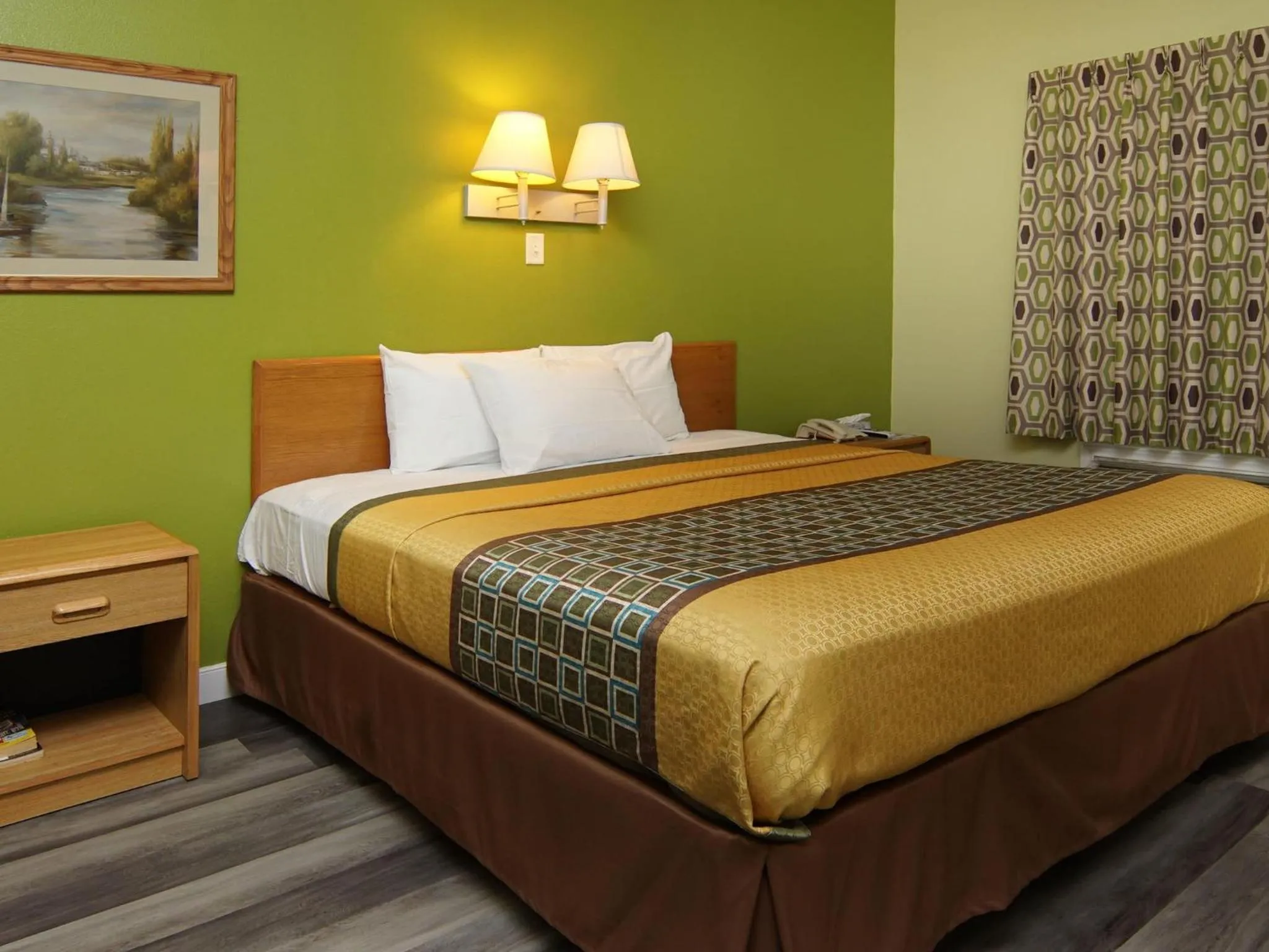 Bed in Quality One Motel