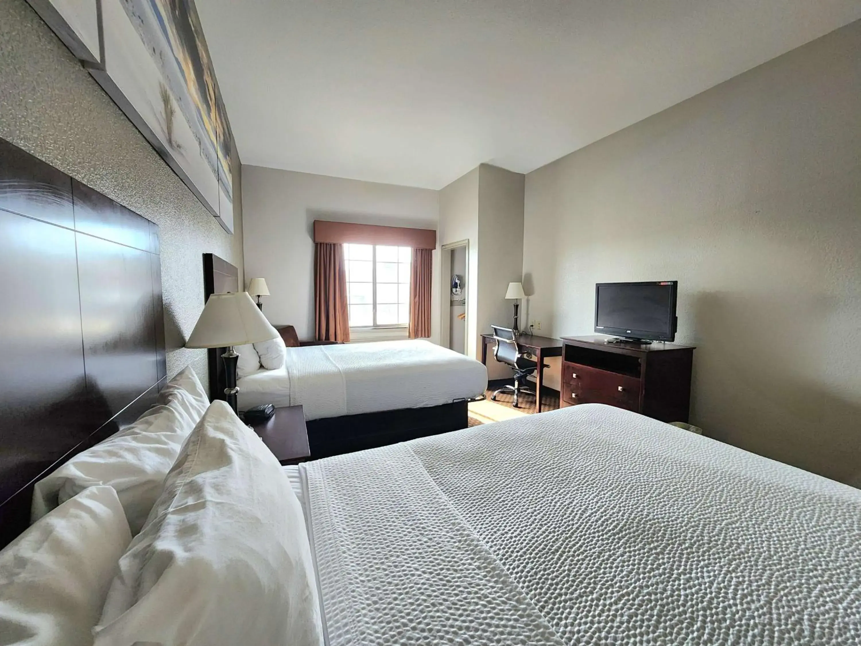 Efficiency Queen Room with Two Queen Beds and Kitchenette - Non-Smoking in Days Inn by Wyndham Kemah Efficiency Queen Room with Two Queen Beds and Kitchenette - Non-Smoking in Days Inn by Wyndham Kemah