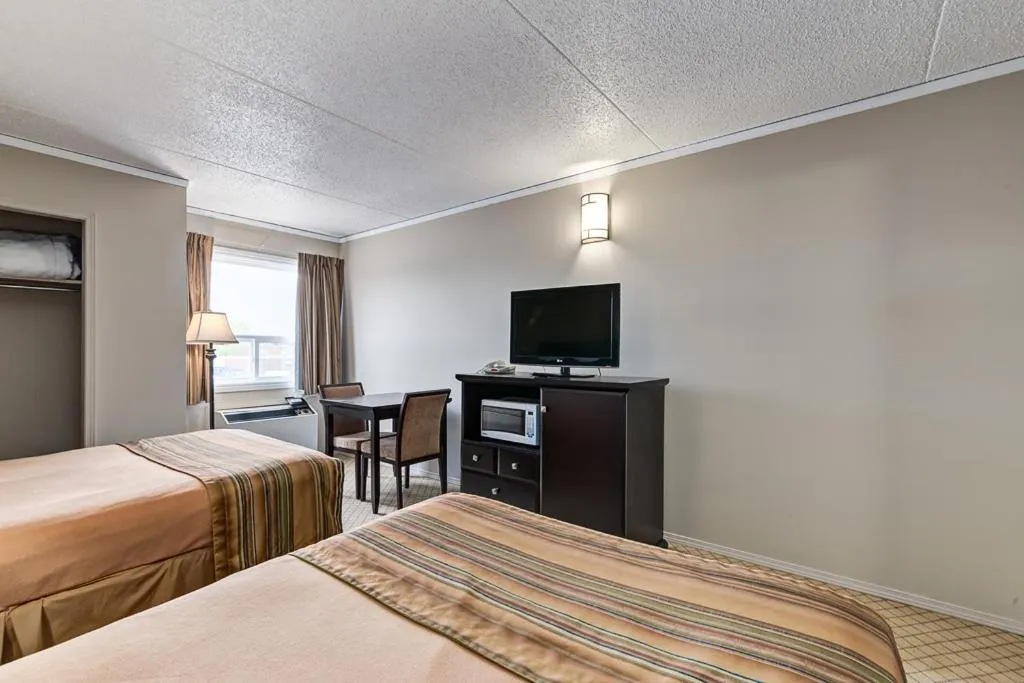 Bed in Airport Traveller's Inn