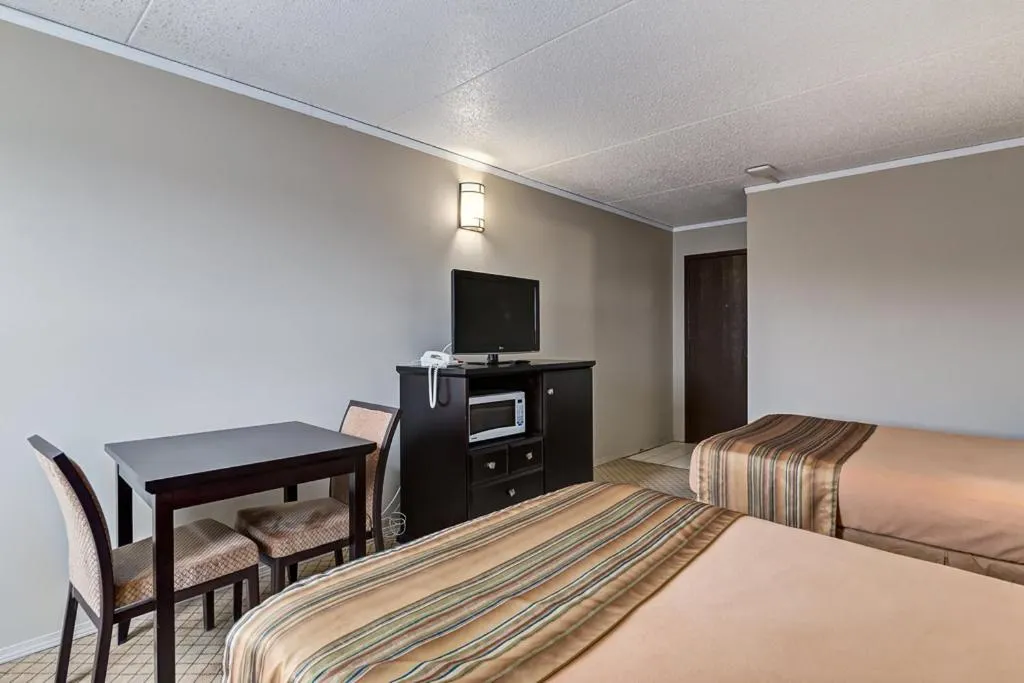 Bed in Airport Traveller's Inn