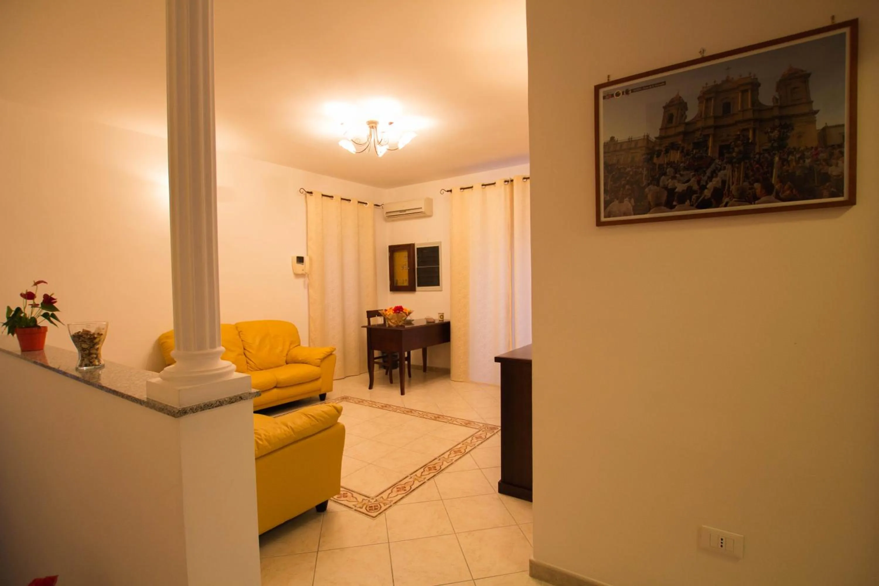 Communal lounge/ TV room in Noto Bedda Bed&Breakfast