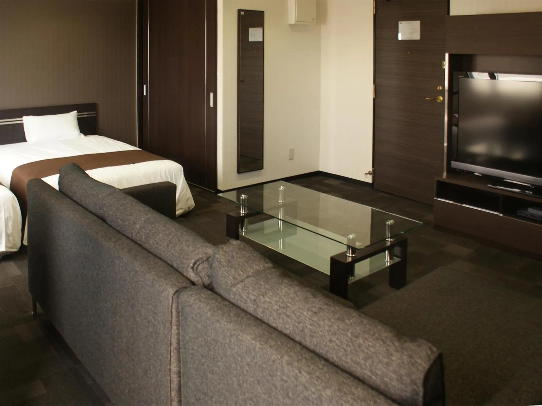 Photo of the whole room, Bed in HOTEL LiVEMAX BUDGET Naha