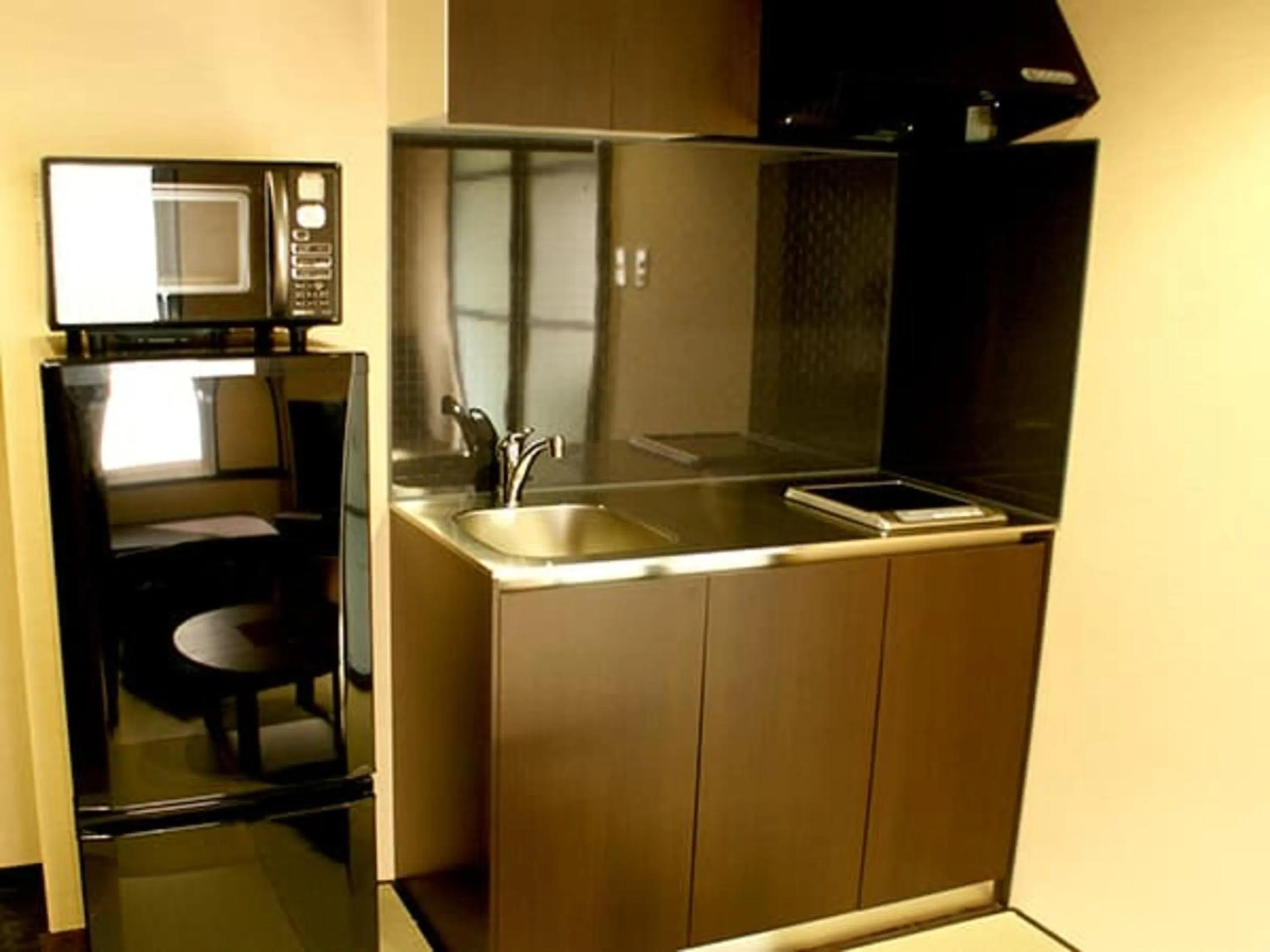 Kitchen or kitchenette in HOTEL LiVEMAX BUDGET Naha