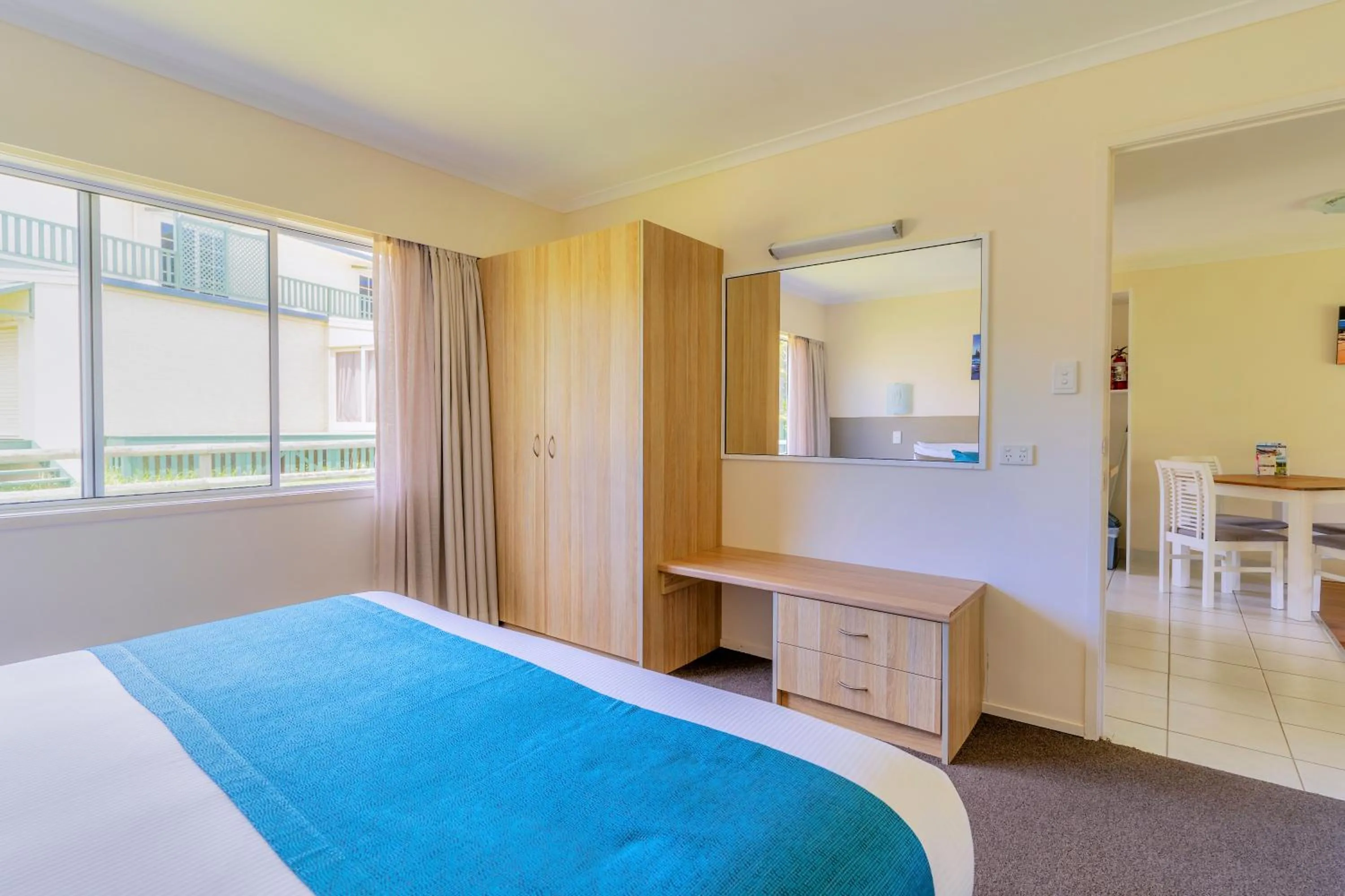 Bed in Aloha Apartments