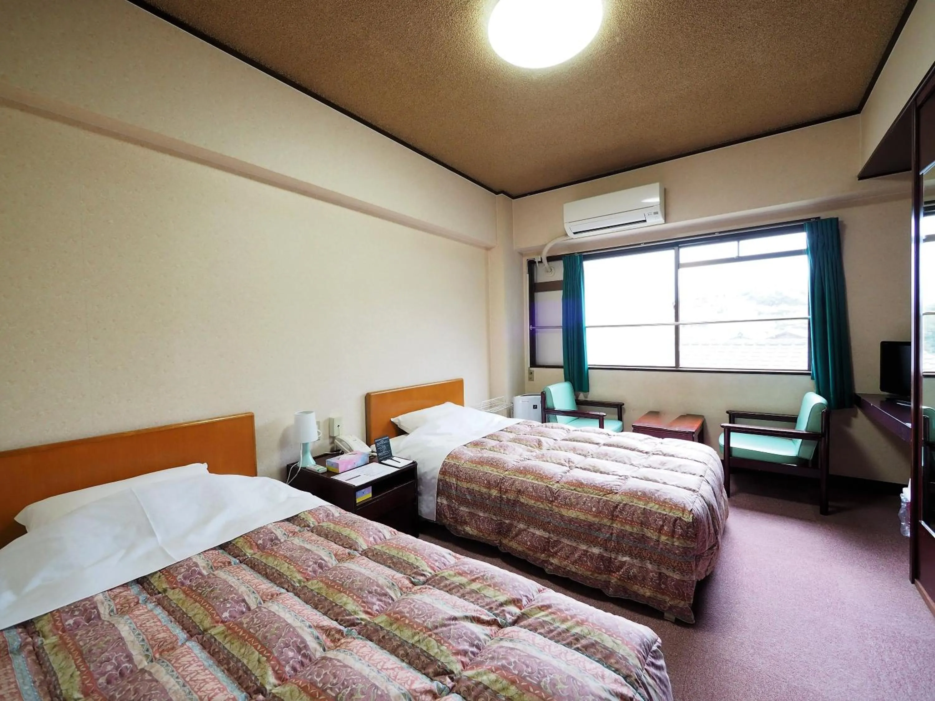 Photo of the whole room, Bed in Sky Heart Hotel Shimonoseki